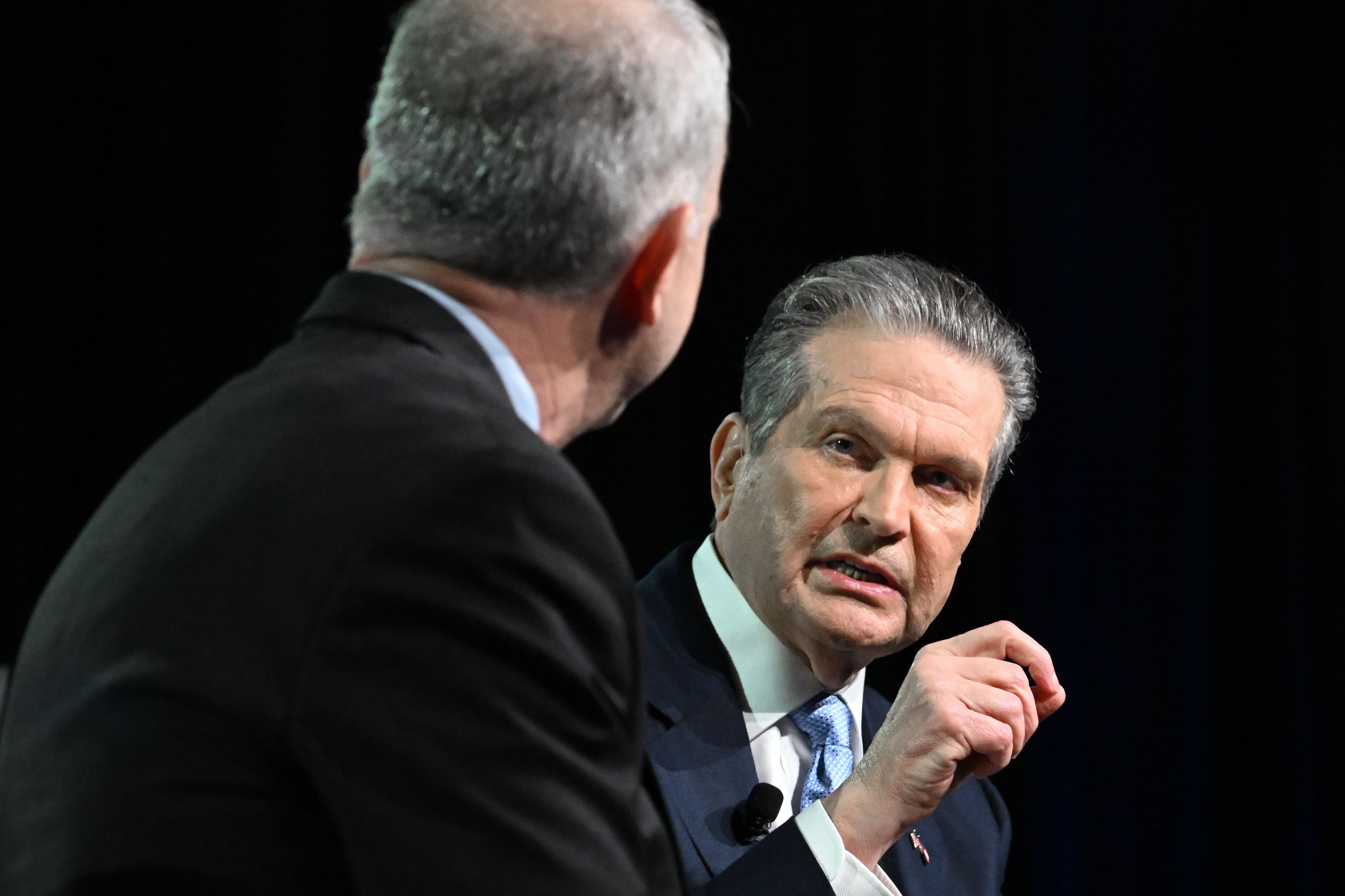 Republican nominee for governor Rick Jackson (right) speaks with moderator Brian Robinson during the Georgia Chamber's annual Congressional Luncheon in Athens on Wednesday. (Hyosub Shin/AJC)