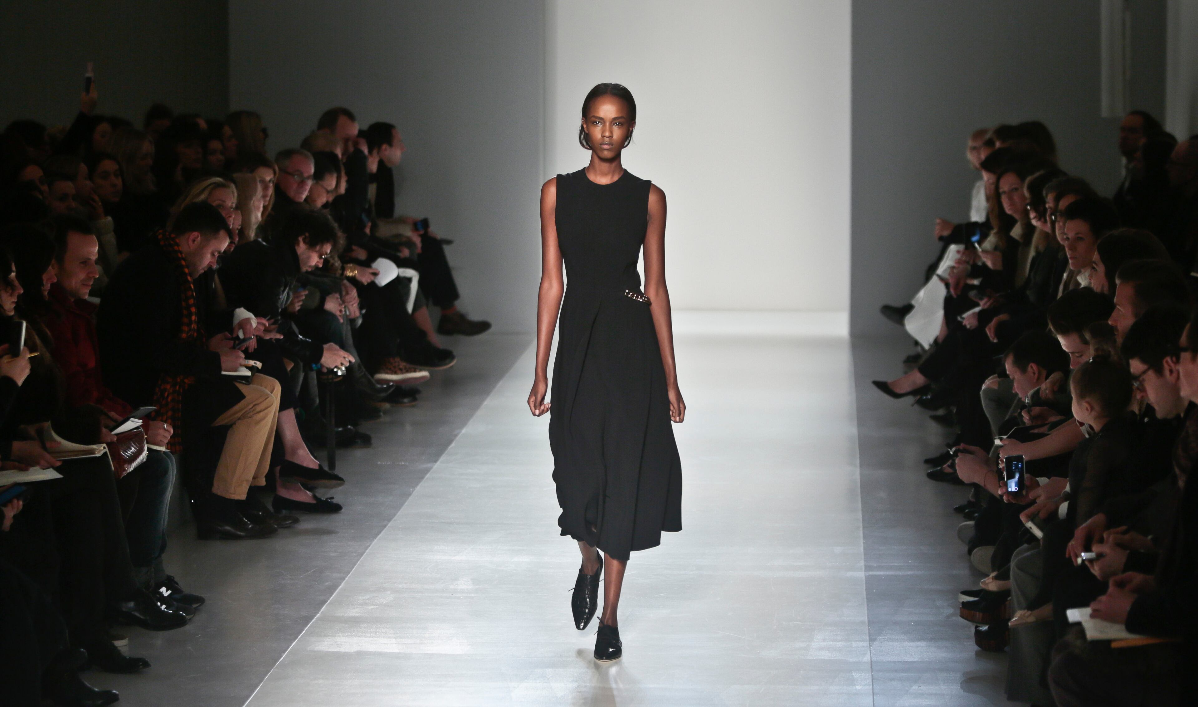 Fashion from the Victoria Beckham Fall 2014 collection is modeled, during New York Fashion Week on Sunday Feb. 9, 2014. (AP Photo/Bebeto Matthews)