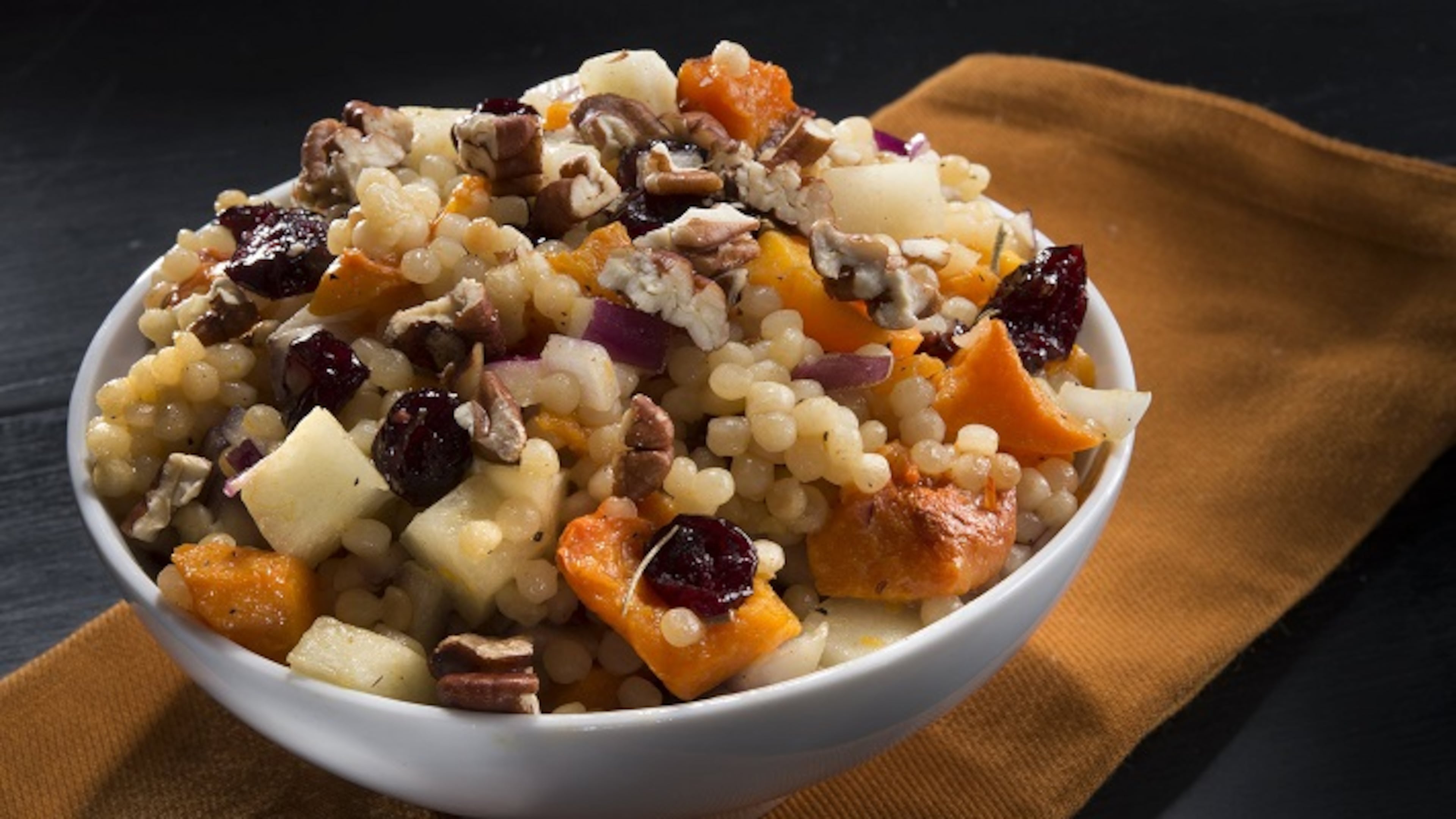 Israeli Couscous With Roasted Butternut Squash pairs the flavors of fall with pearl-shaped Israeli couscous. (Tammy Ljungblad/Kansas City Star/TNS)