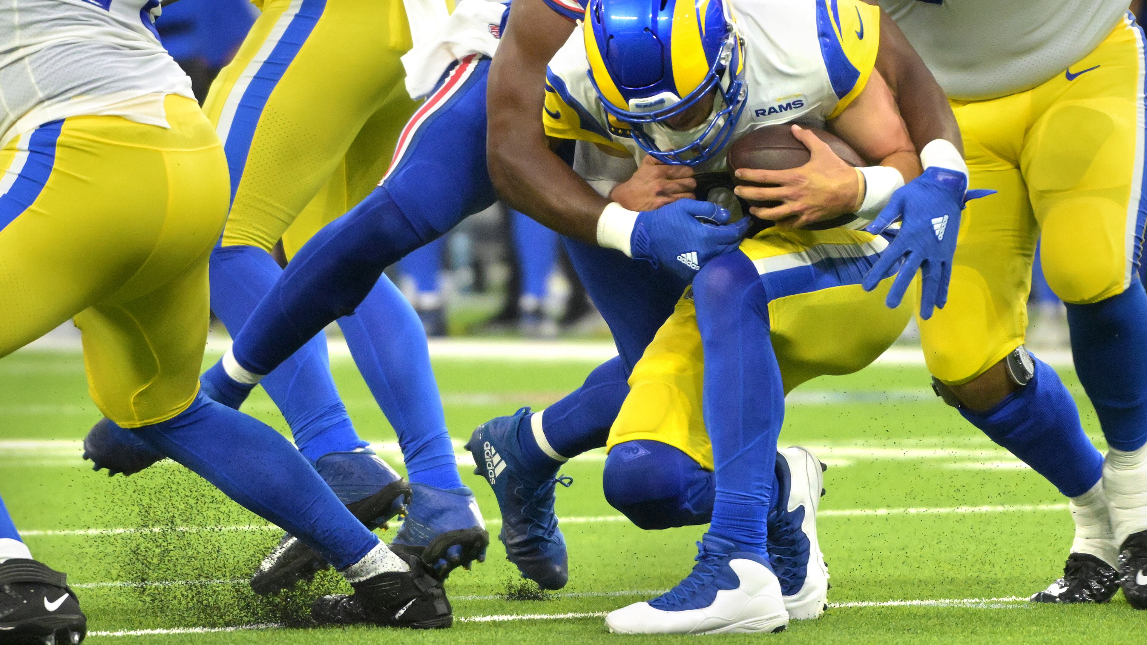 Los Angeles Rams quarterback Matthew Stafford is sacked by Buffalo Bills defensive end Greg Rousseau (50) in the third quarter at SoFi Stadium on Thursday, Sept. 8, 2022, in Inglewood, California. (Wally Skalij/Los Angeles Times/TNS)