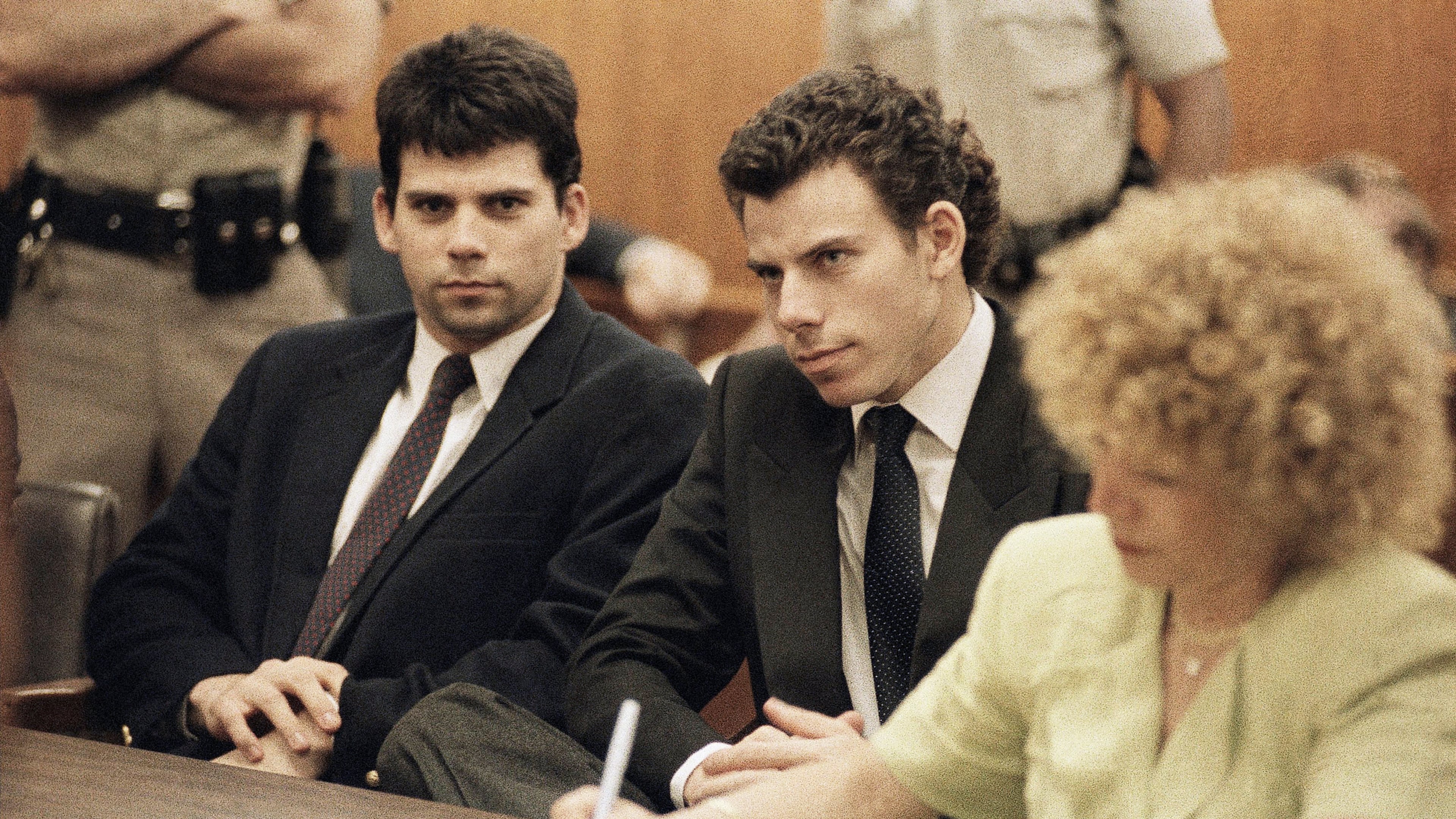 FILE - Lyle, left, and Erik Galen Menendez sit in a courtroom in Beverly Hills, Calif., May 14, 1990. (AP Photo/Kevork Djansezian, File)