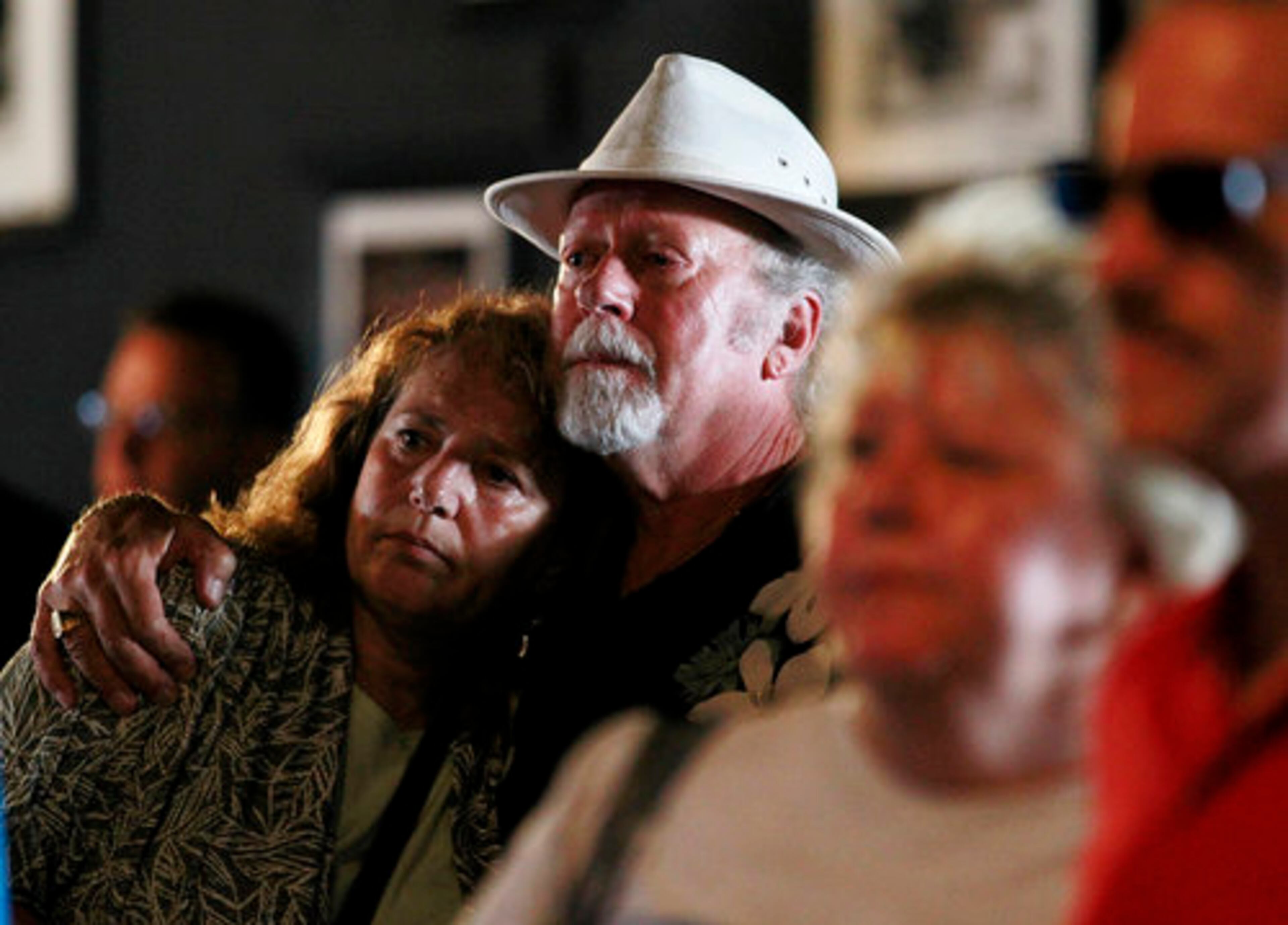 Charles Cox, second from left, and his wife, MaryAnn Roper, of Freehold, N.J., attended the memorial.