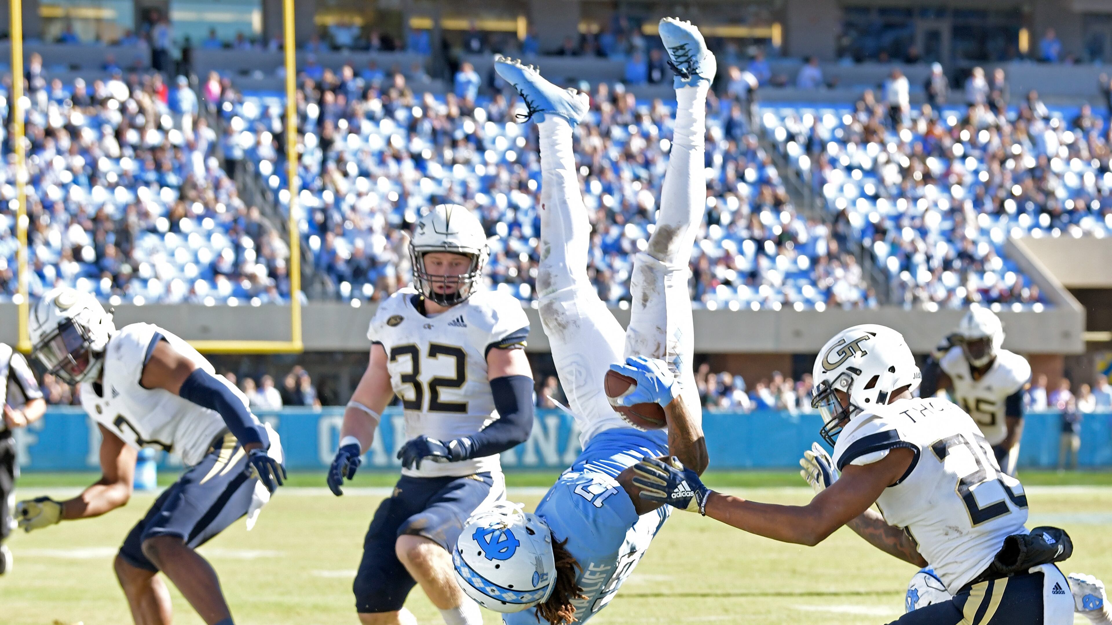 North Carolina's Anthony Ratliff-Williams is sent heels over head by the Georgia Tech defense. (Grant Halverson/Getty Images)