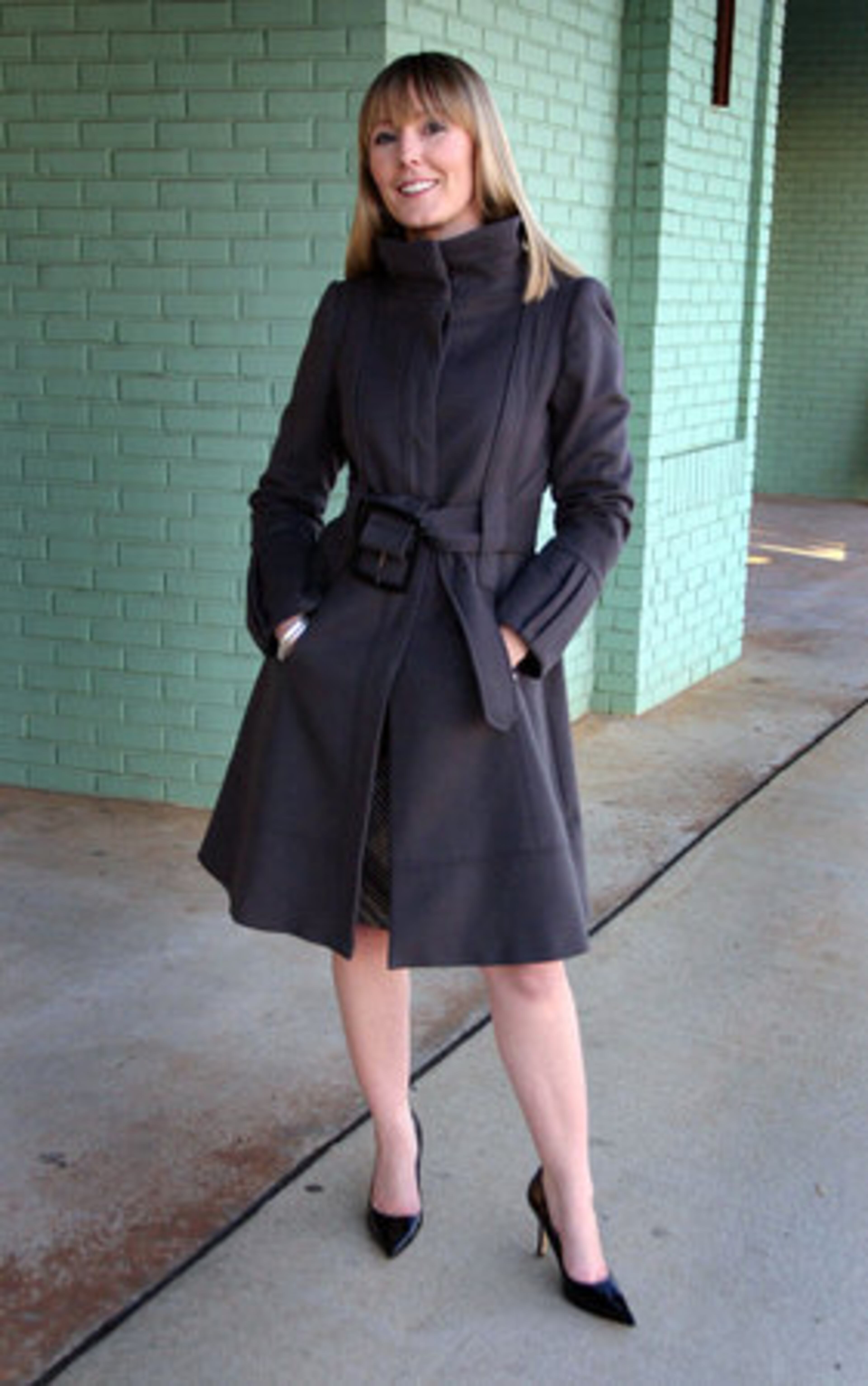 Blanco wears her grey wool coat from Zara and shoes from Nine West.
