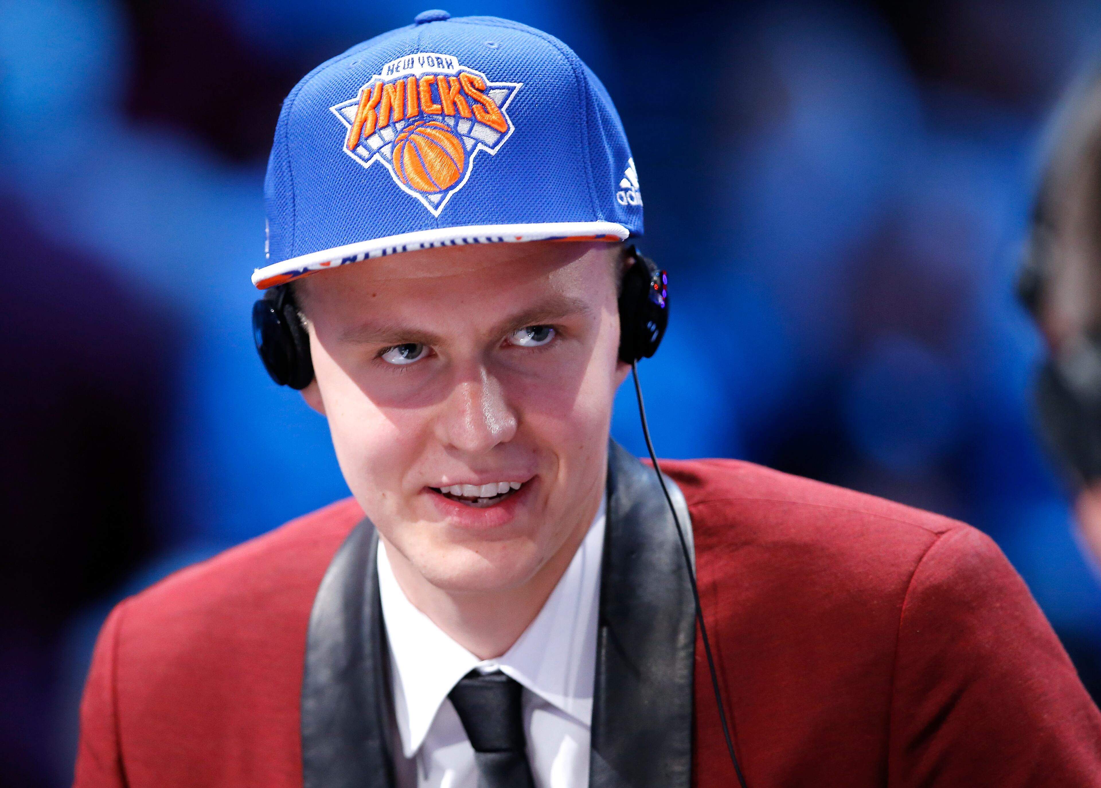 Kristaps Porzingis answers questions during an interview after being selected fourth overall by the New York Knicks during the NBA basketball draft, Thursday, June 25, 2015, in New York. (AP Photo/Kathy Willens)