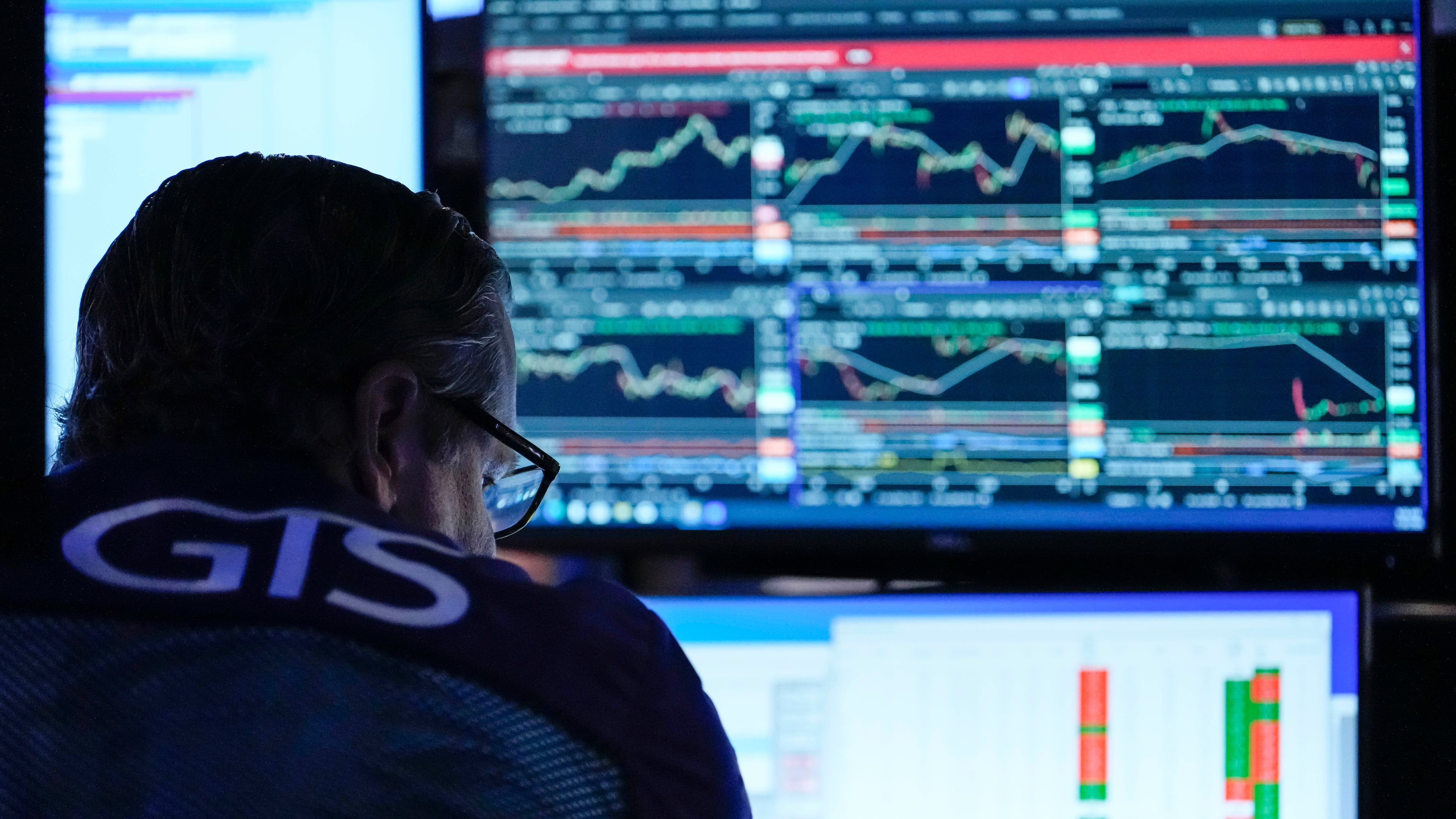A trader works on the floor of the New York Stock Exchange, Thursday, July 30, 2026, in New York. (AP Photo/Yuki Iwamura)