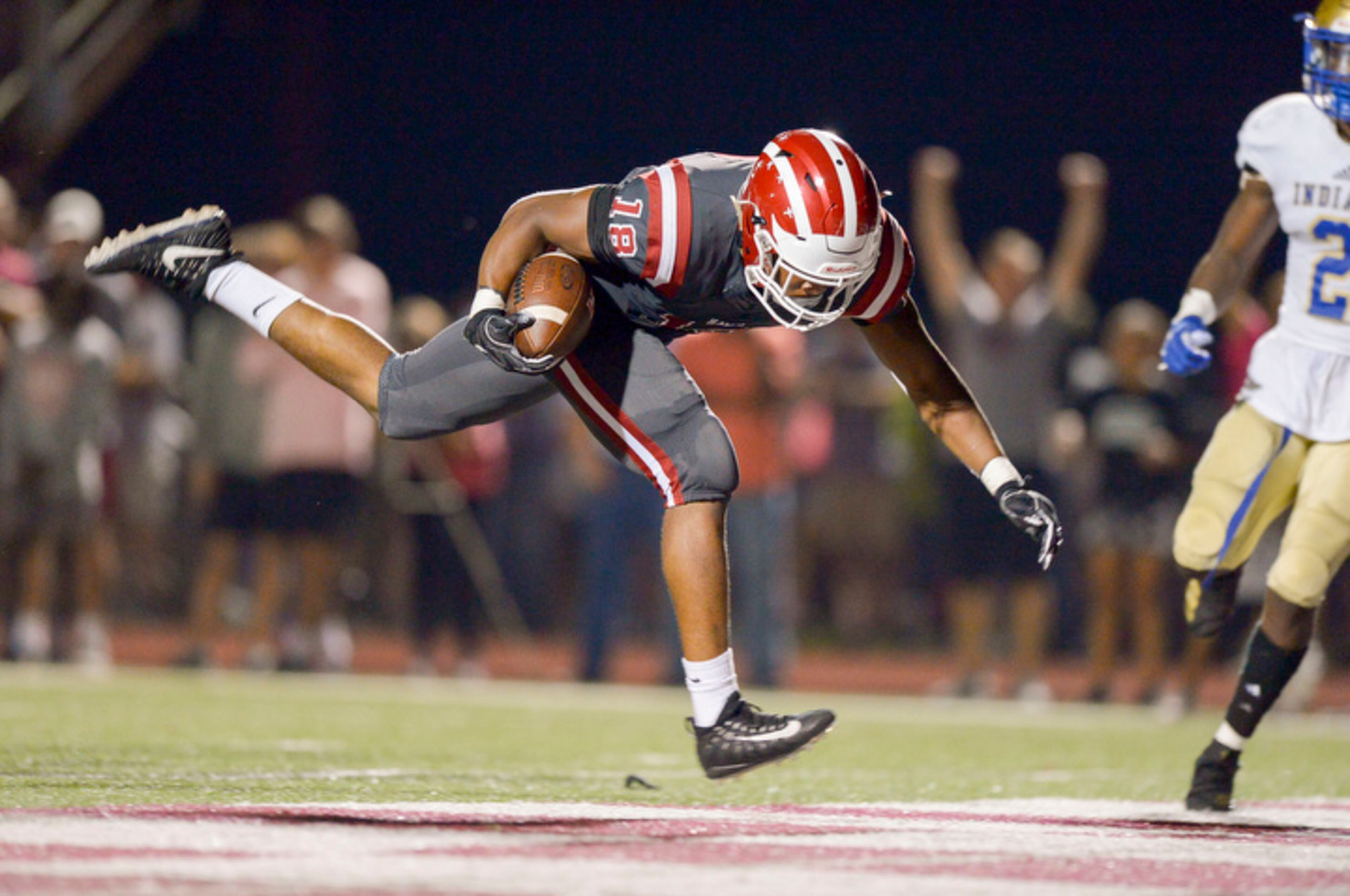 Hillgrove senior WR Darrell Jackson (18) stumbles into the end zone for a touchdown early in the first half of his game Friday, October 5, 2018 at Hillgrove High School. PHOTO/Daniel Varnado