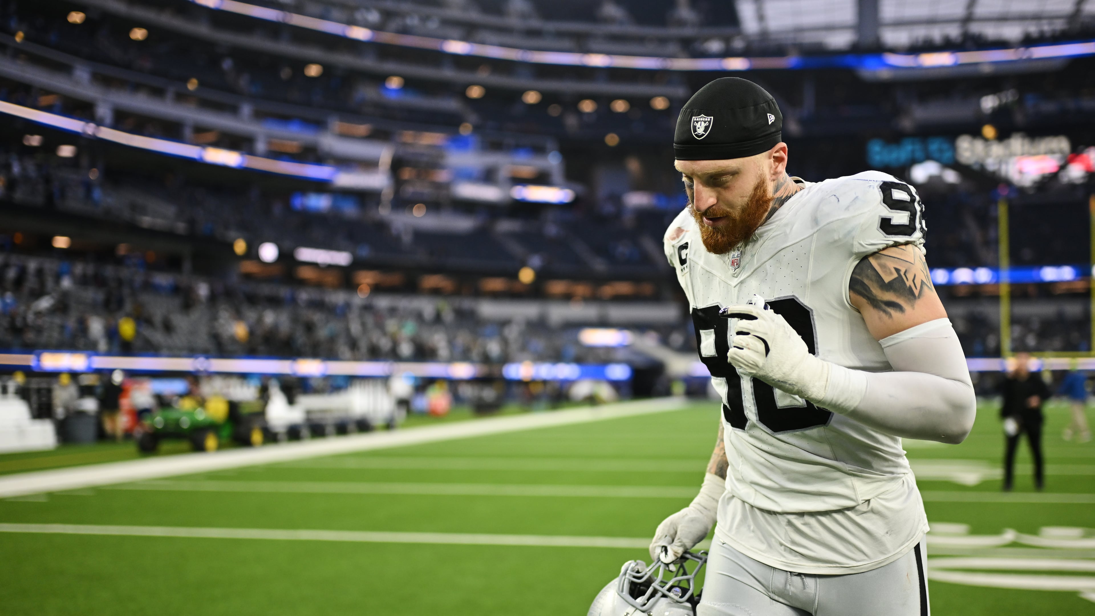 Las Vegas Raiders defensive end Maxx Crosby jogs off the field after an NFL football game against the Los Angeles Chargers, Sunday, Nov. 30, 2025, in Inglewood, Calif. (AP Photo/William Liang)