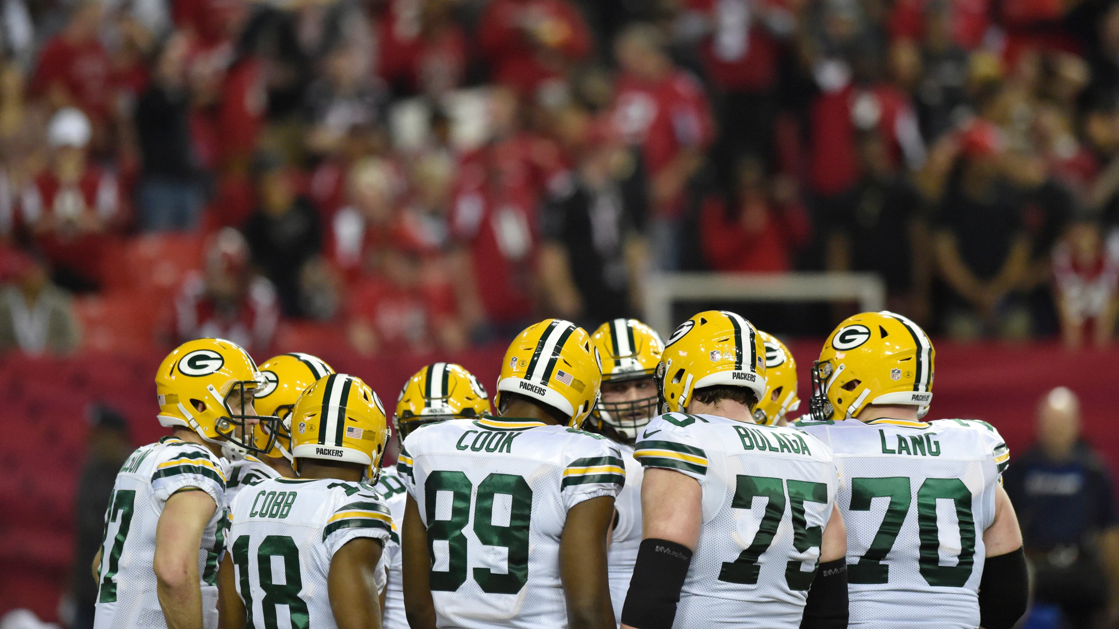 January 22, 2017, Atlanta - Members of the Packers football team meet in a huddle during the NFC Championship game against the Packers in Atlanta, Georgia, on Sunday, January 22, 2017. (DAVID BARNES / DAVID.BARNES@AJC.COM)