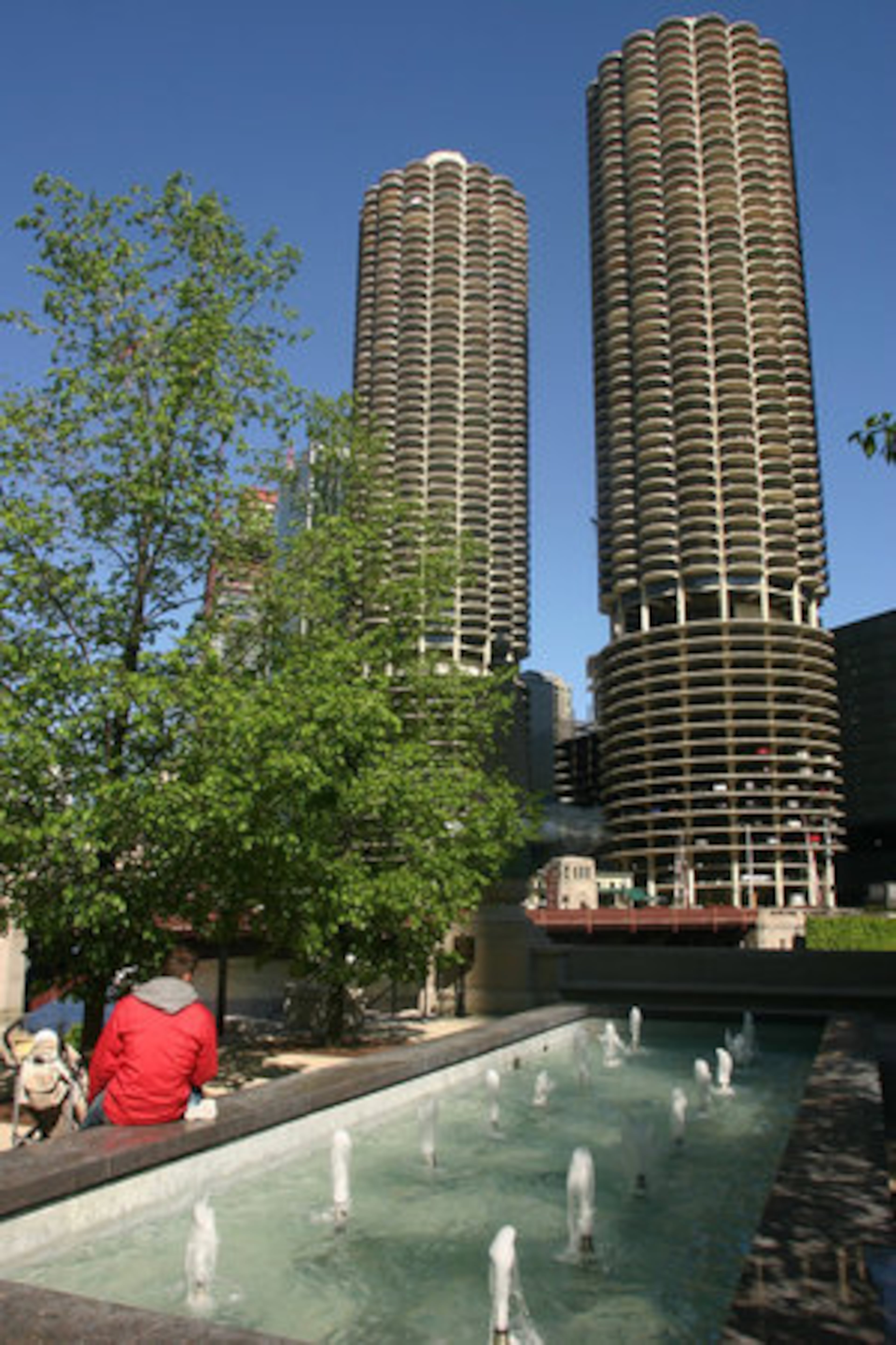 The Twin Towers of Marina City were designed to be a "city within a city, " and today contain parking, residences, shops and the House of Blues.