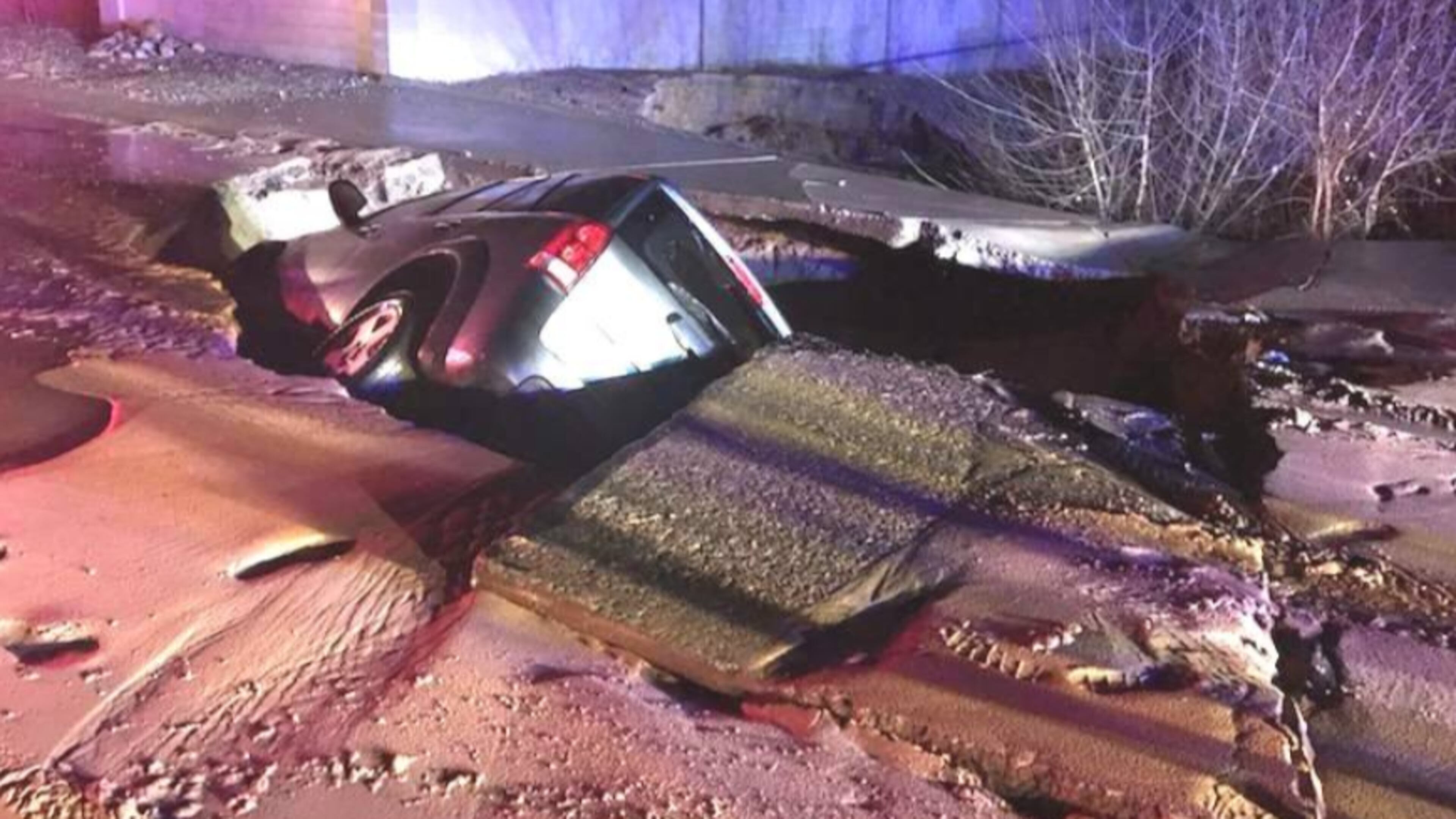 A sinkhole swallows an SUV in New Mexico.