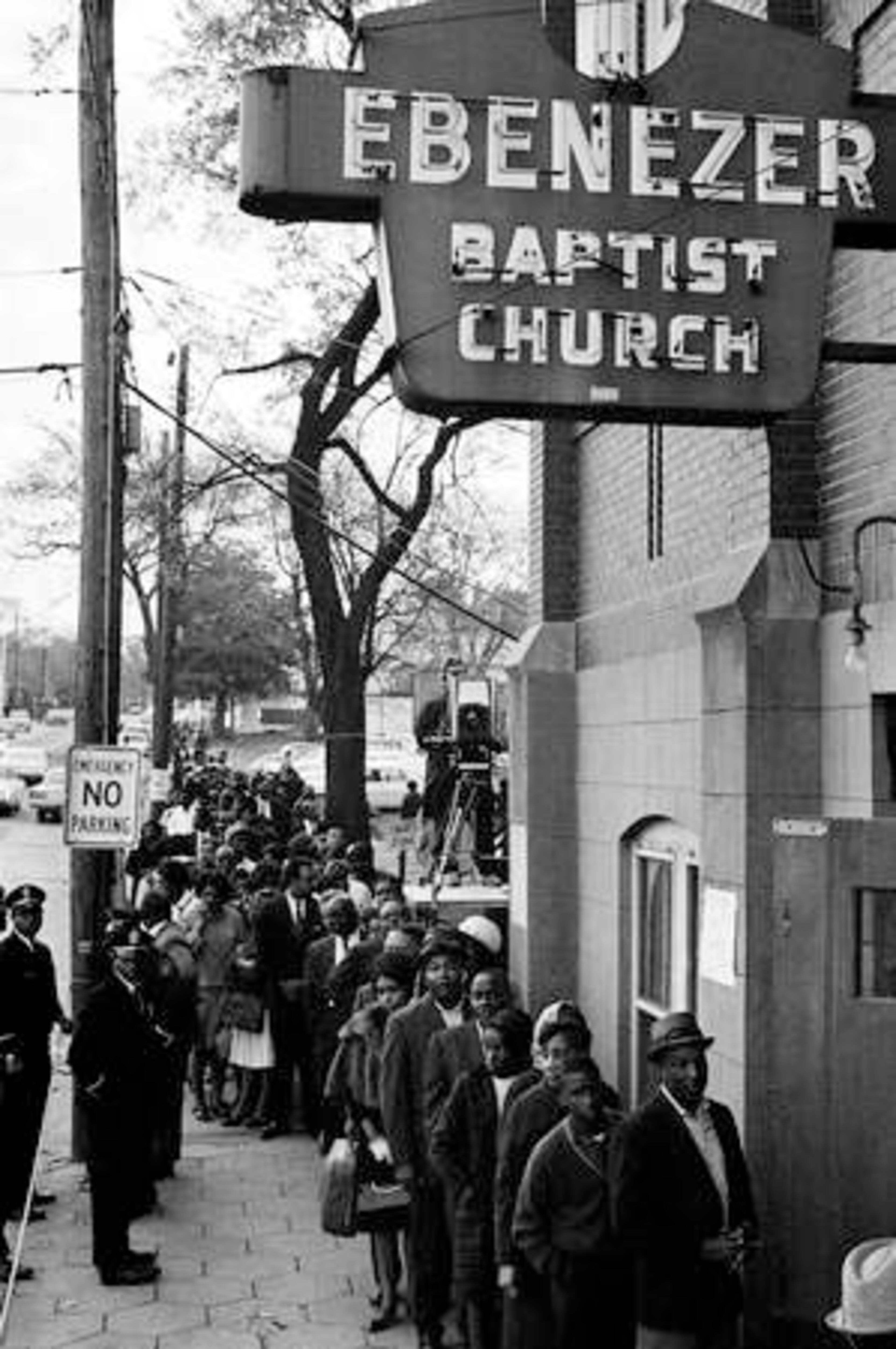 Mourners waiting to view the body of Dr. King queue up outside Ebenezer Baptist Church in Atlanta just after dawn in April 9, 1968.