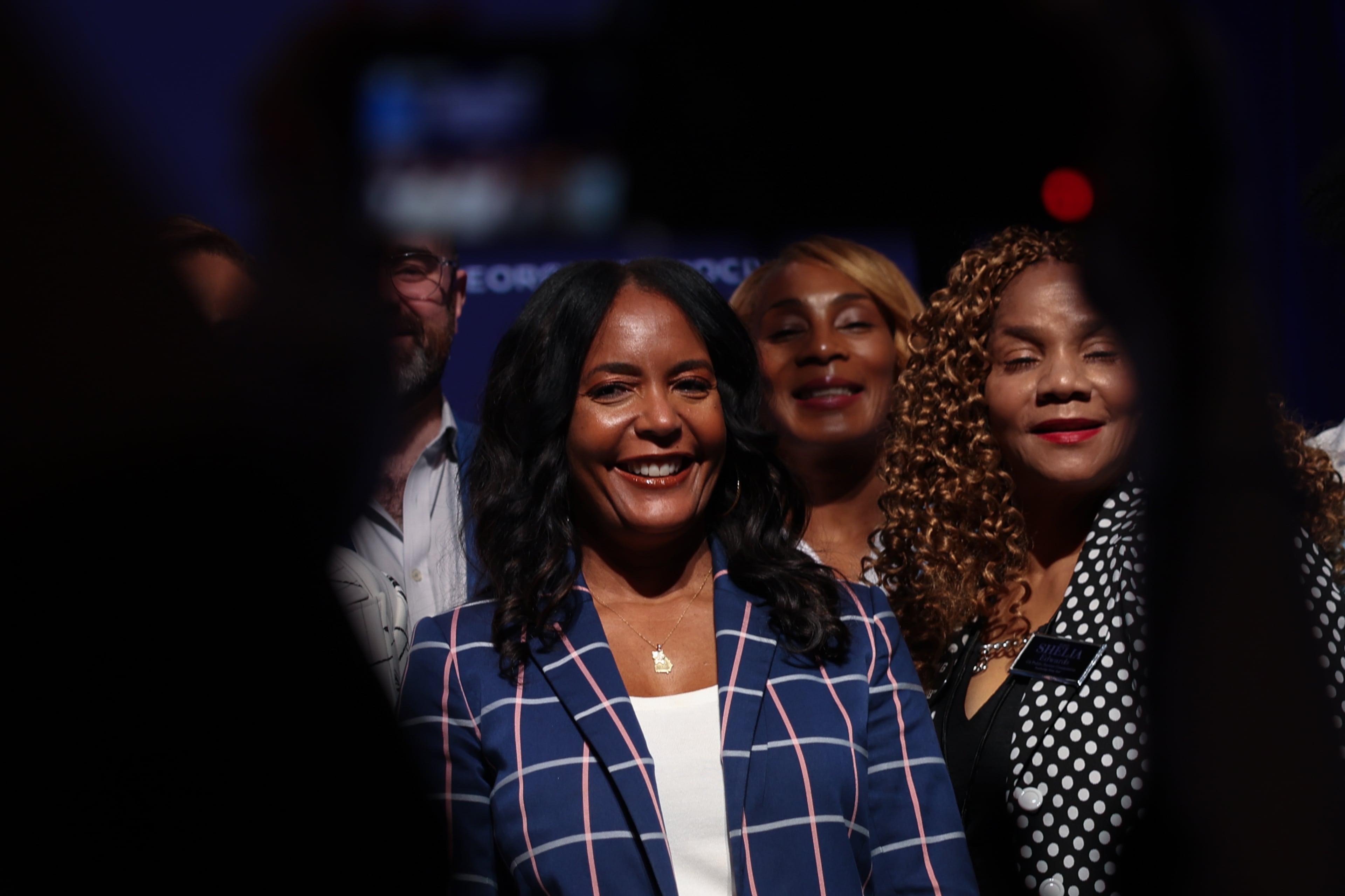 Democratic gubernatorial candidate Keisha Lance Bottoms poses for photos with other statewide candidates at the Savannah Convention Center in Savannah on Saturday, Aug. 1, 2026. (Arvin Temkar/AJC)