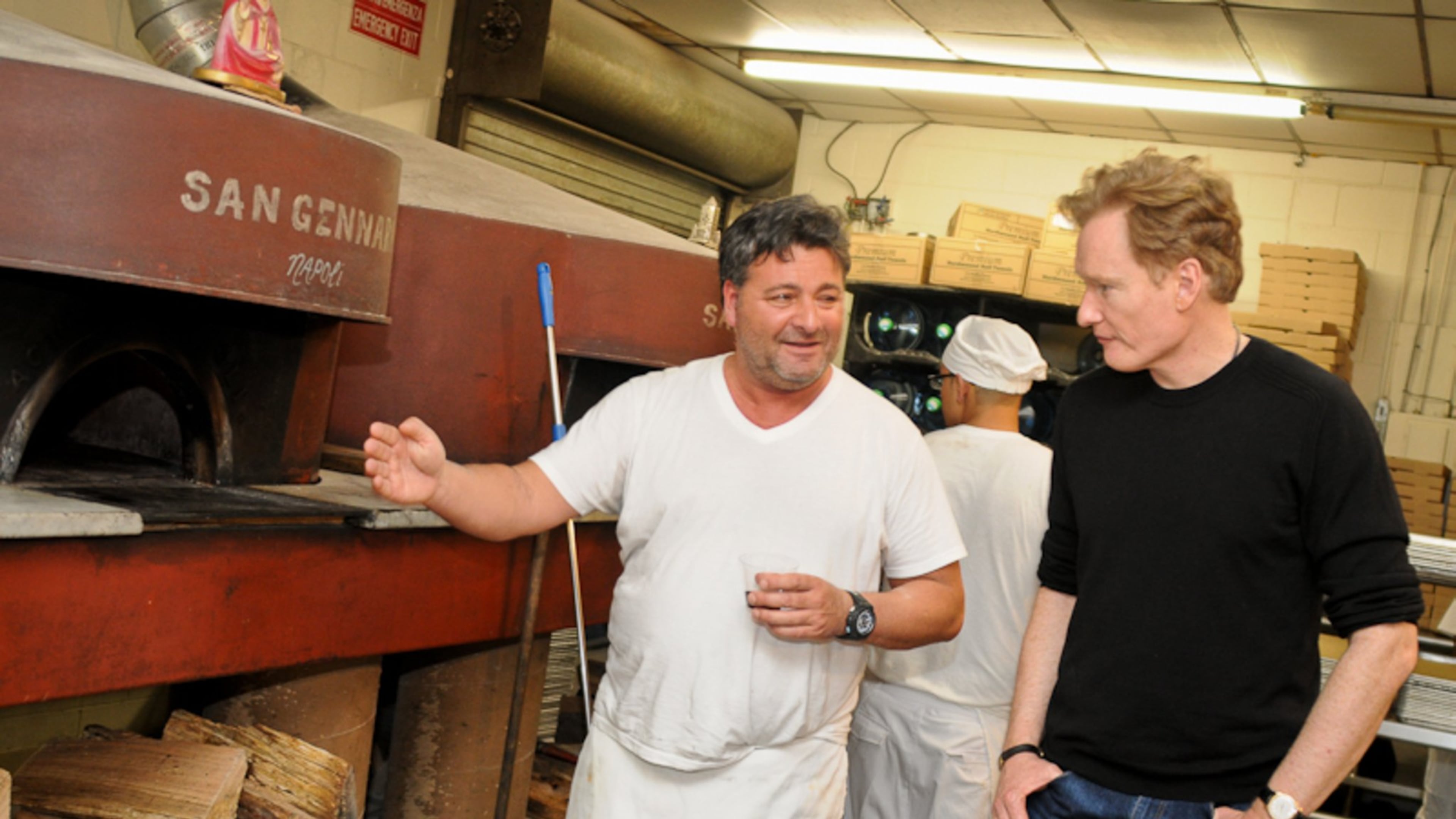 Giovanni Di Palma at Antico Pizza with Conan O'Brien. DiPalma's attorney says the restaurateur has never threatened any employee with deportation or termination.