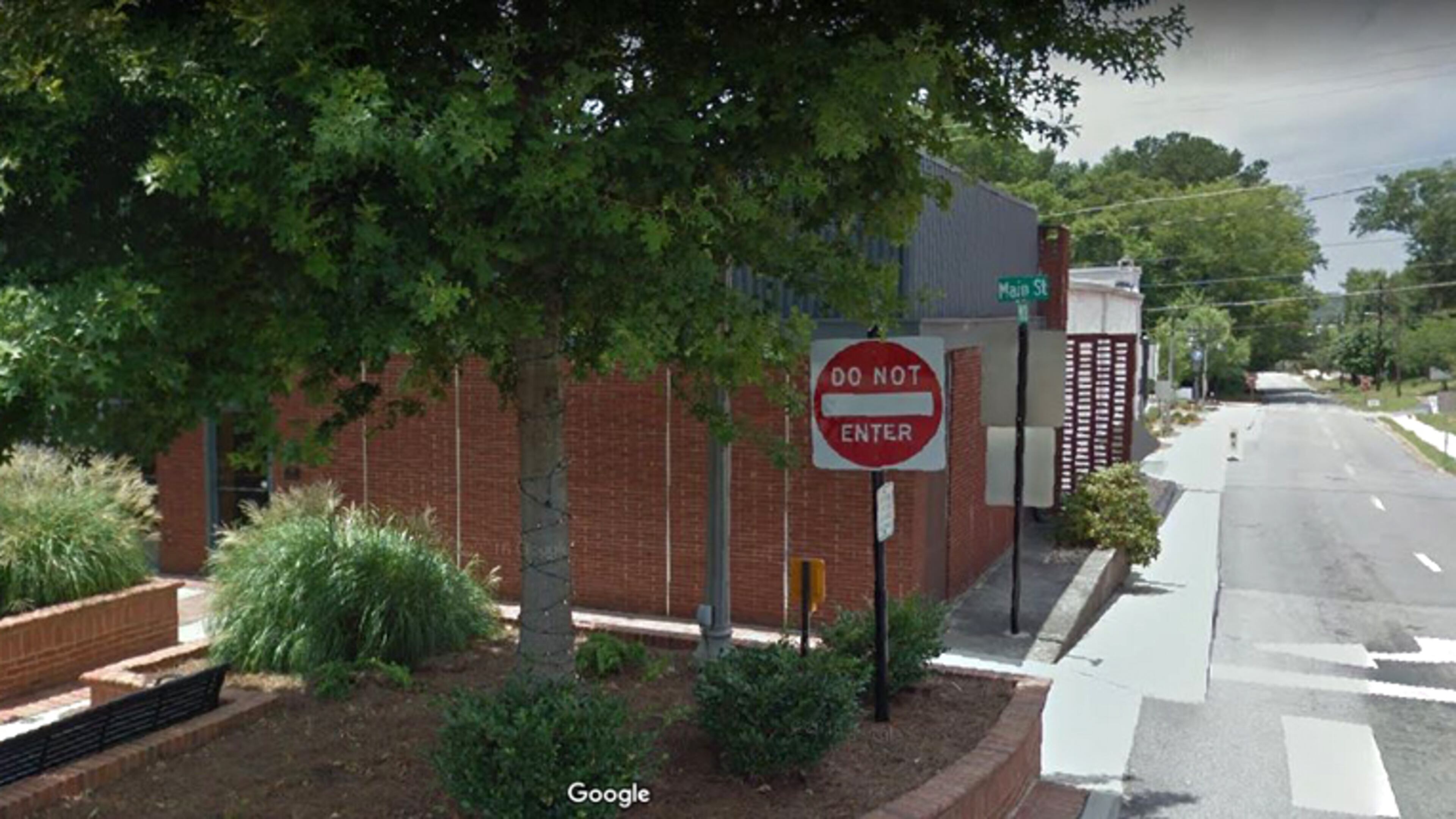 The Johnston Building, at Main and Mill streets in downtown Woodstock, is to be replaced, and construction will close Wall Street behind the building for six months. GOOGLE MAPS