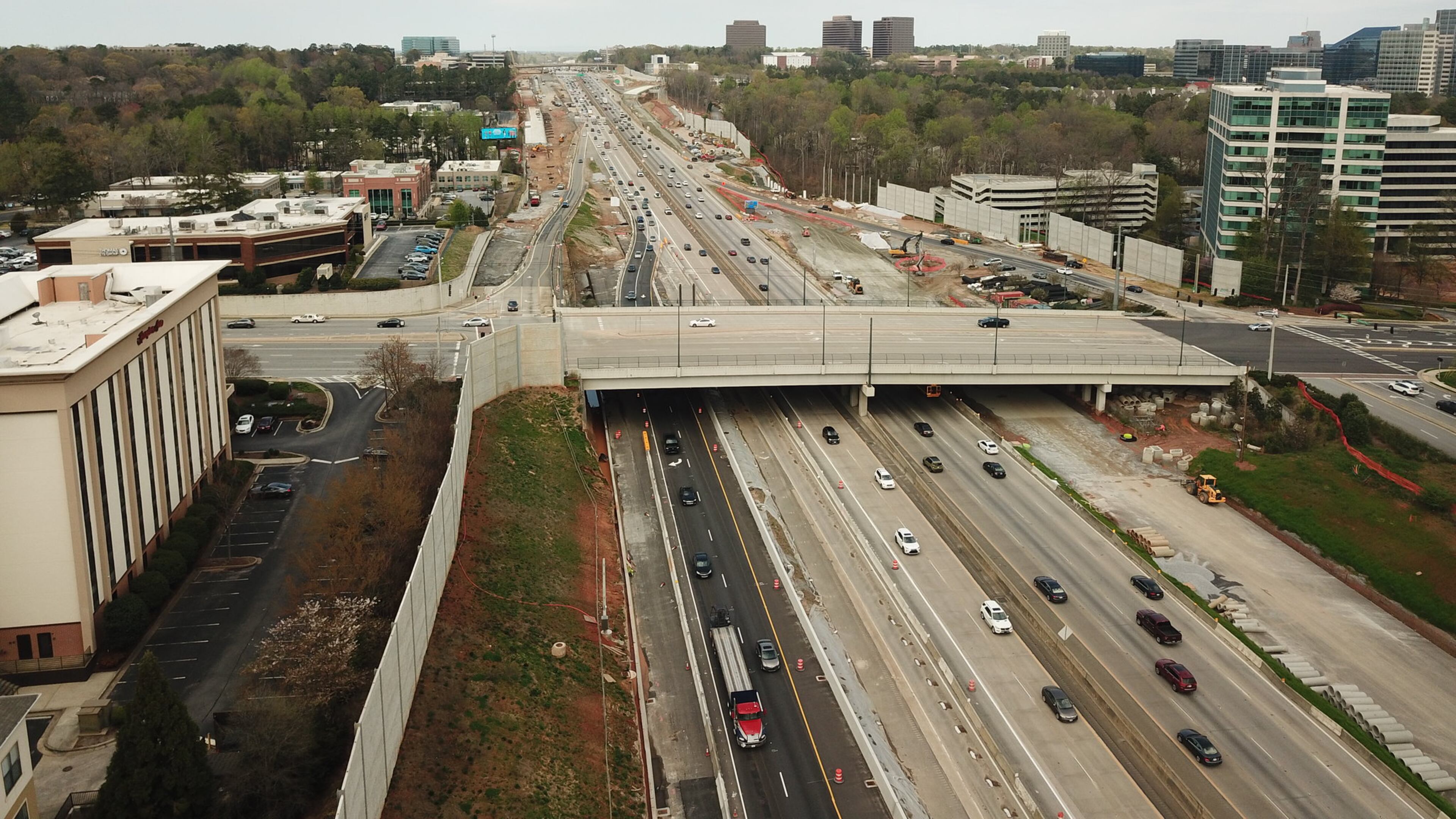 GDOT construction partners will close lanes on I-285 eastbound and westbound and Ga. 400 northbound and southbound for roadway, noise barrier and bridge construction. (Courtesy GDOT)