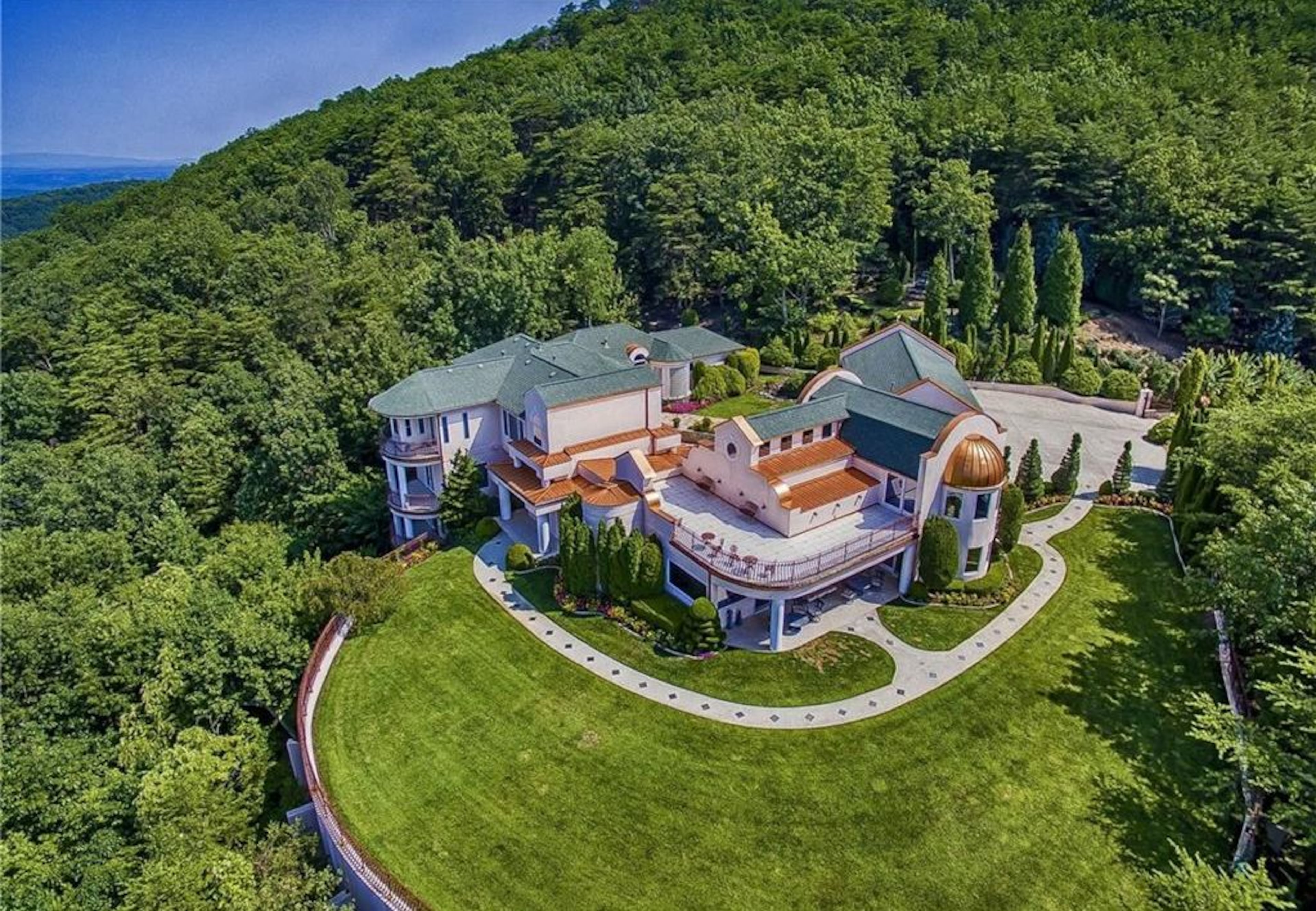 This Marietta mansion spans 8,104 square feet and comes with six bedrooms and five-and-a-half bathrooms, according to the listing on Zillow.com.