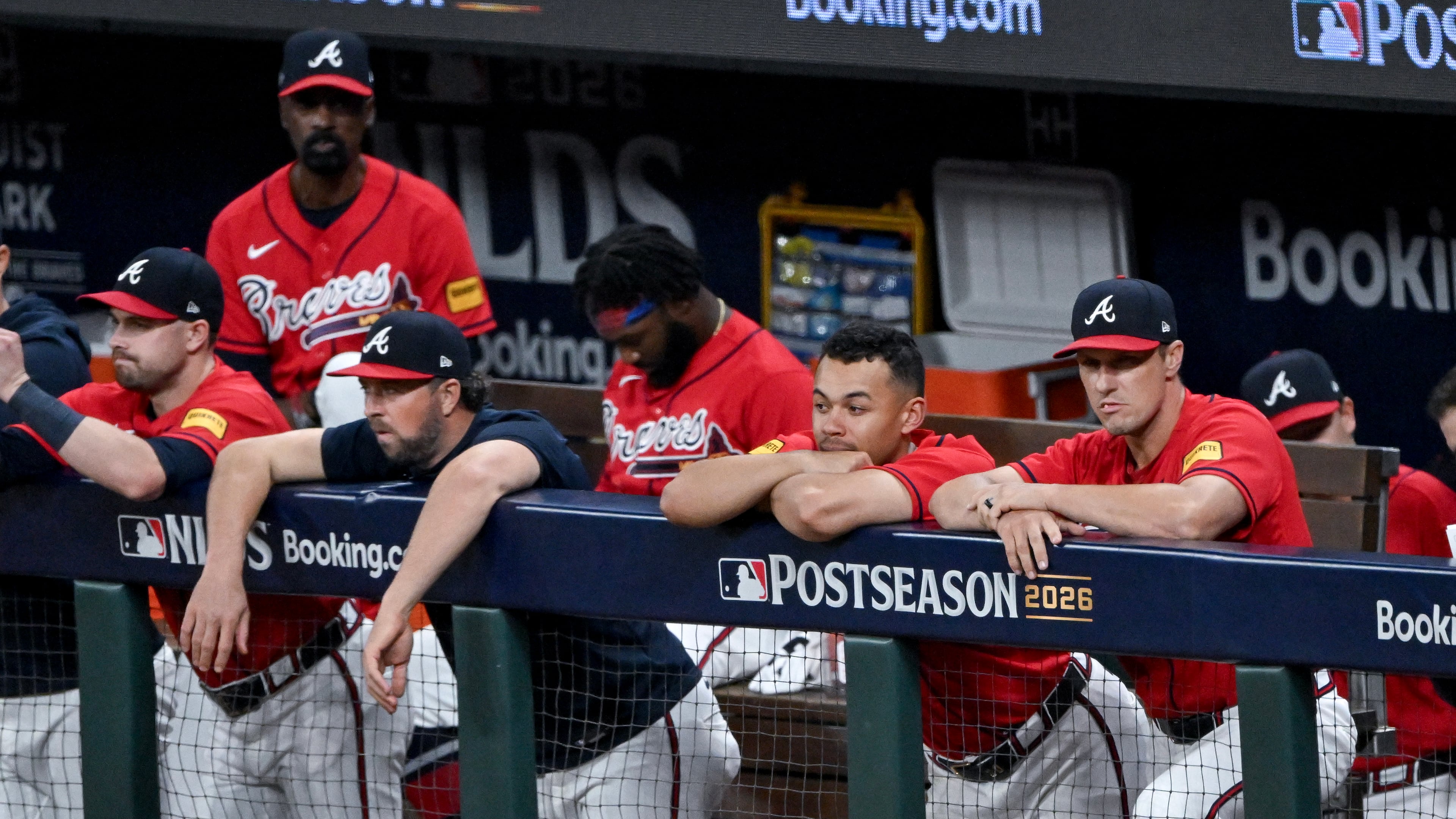 The Atlanta Braves watch from the dugout against the Los Angeles Dodgers during the ninth inning of Game 3 of the MLB National League Division Series between the Atlanta Braves and the Los Angeles Dodgers, Tuesday, Oct. 6, 2026, in Atlanta. (Hyosub Shin/AJC)