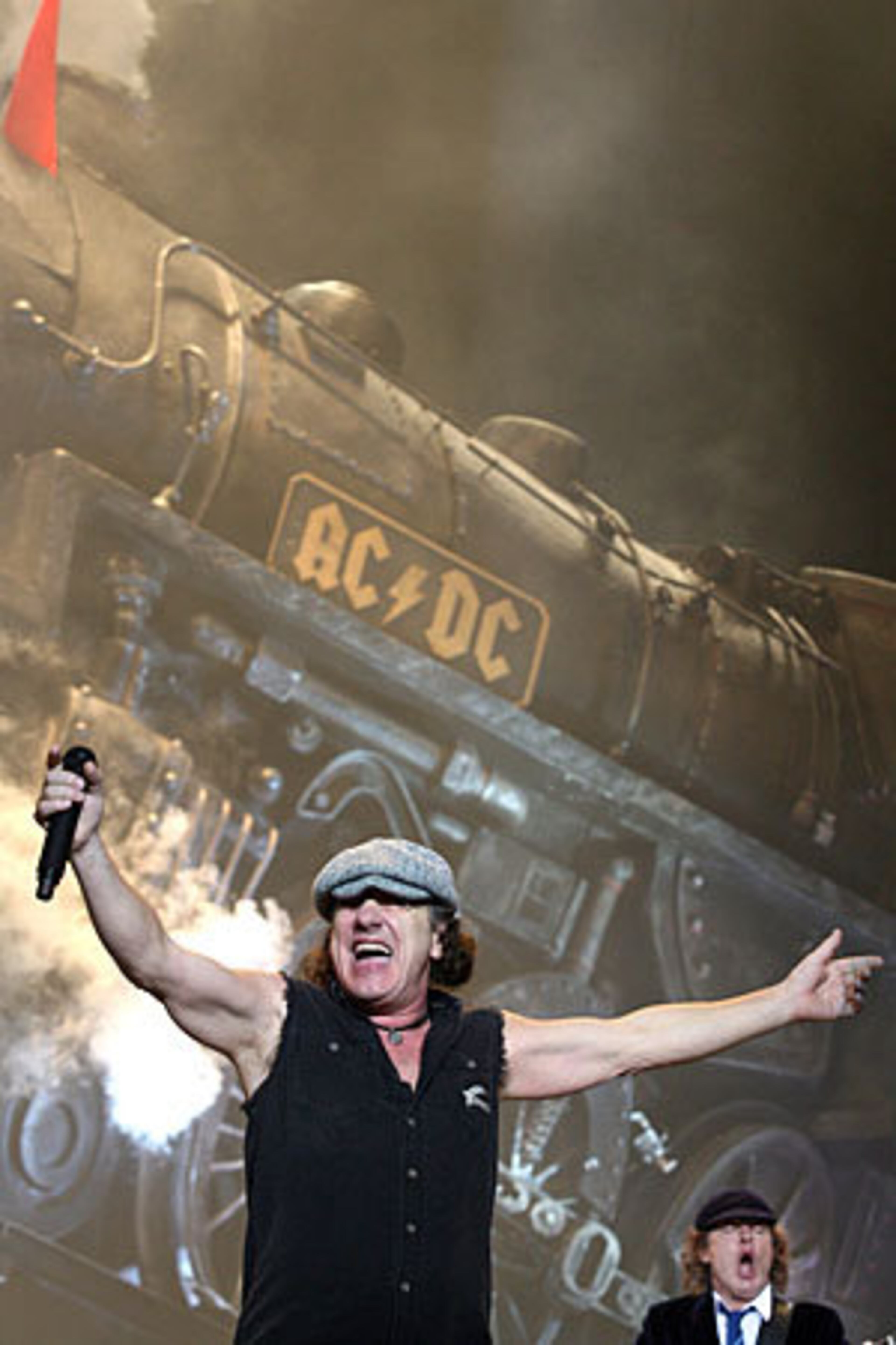 Brian Johnson and Angus Young of AC/DC perform.
