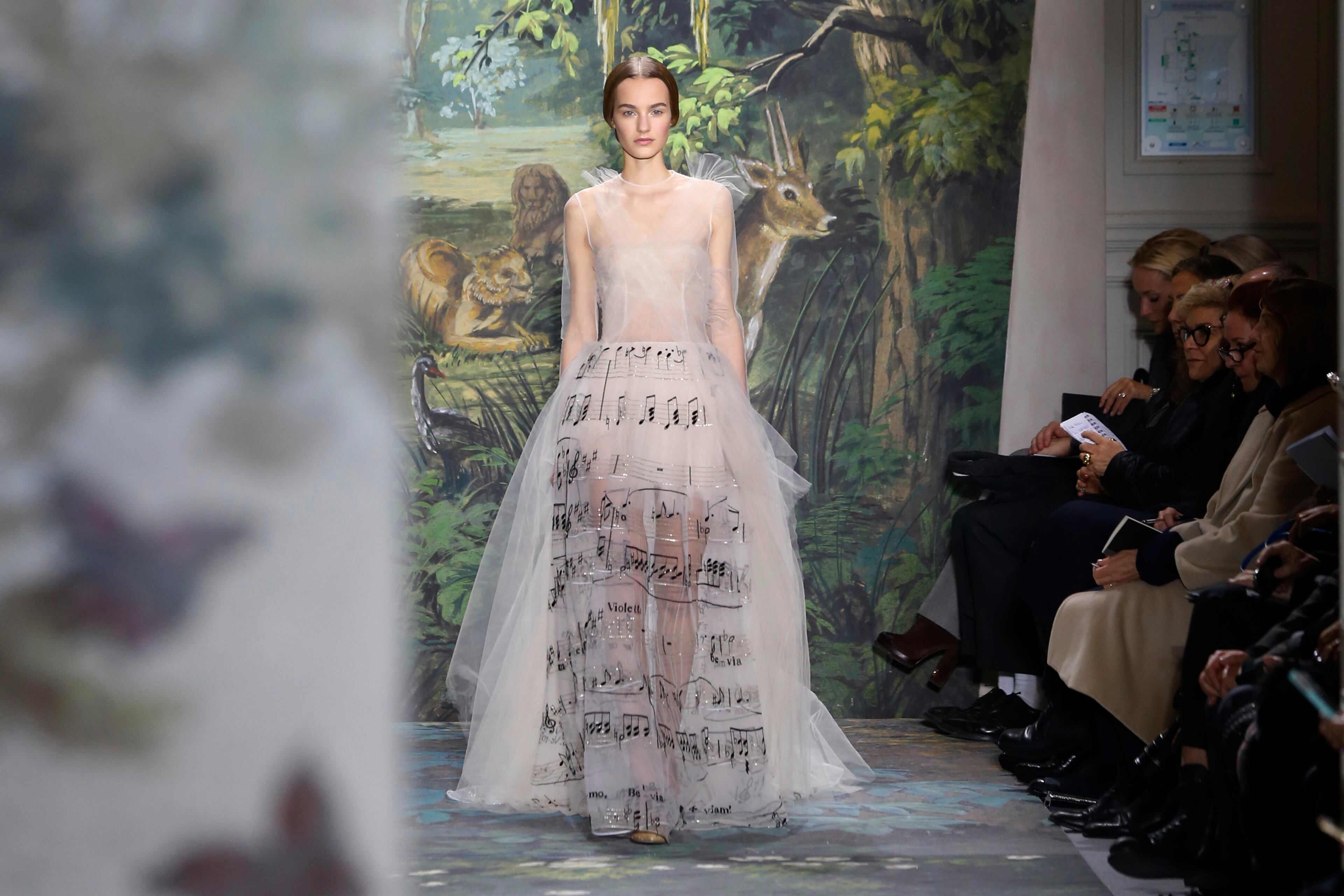 A model presents a creation as part of the Valentino Spring-Summer 2014 Haute Couture fashion collection, presented Wednesday, Jan. 22, 2014, in Paris. (AP Photo/Jacques Brinon)