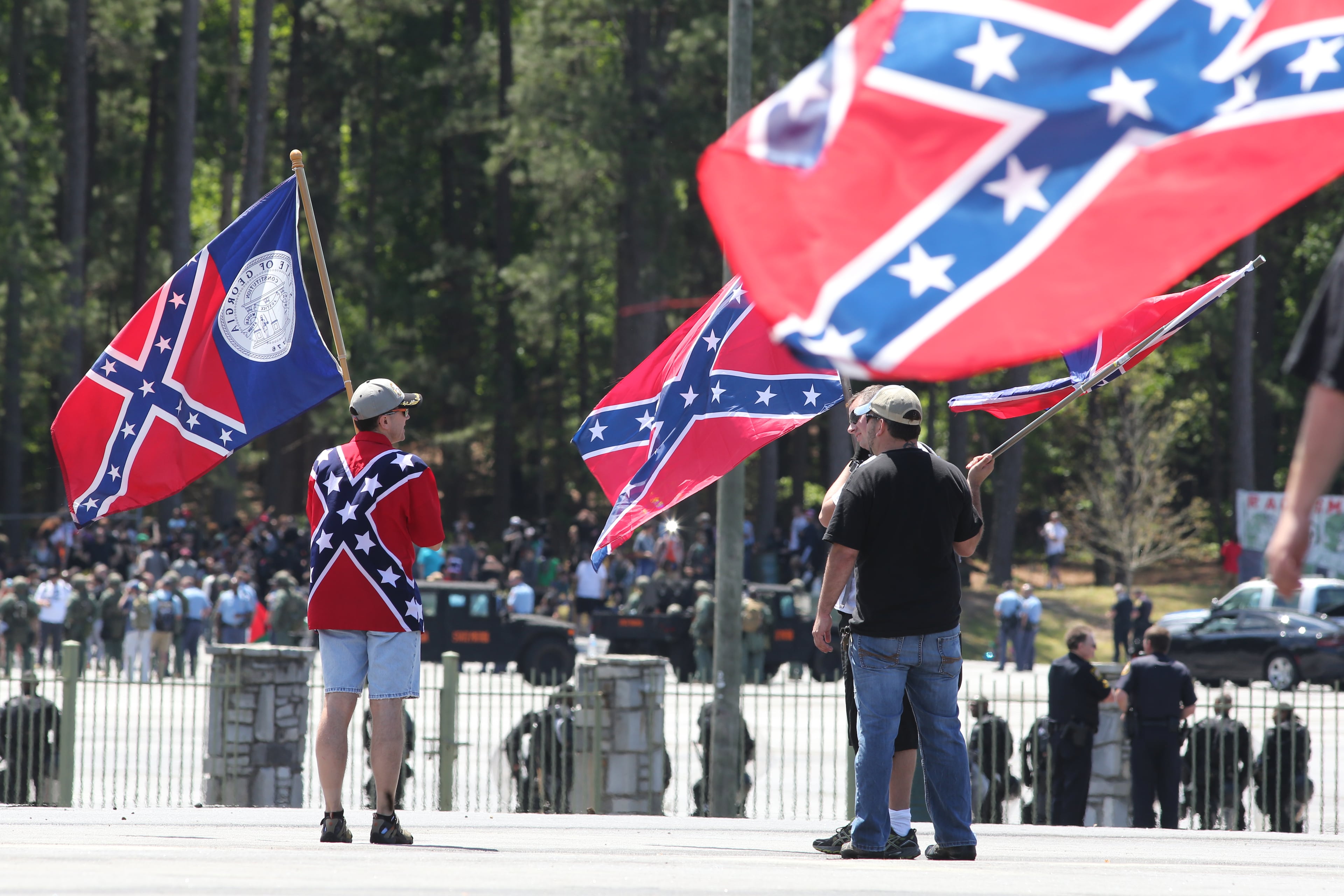 Participants at a "white power" rally at Stone Mountain Park on Saturday morning April 23, 2016. Two separate counter-protests are also planned to take place at the park in opposition to the white supremacist group. Ben Gray / bgray@ajc.com
