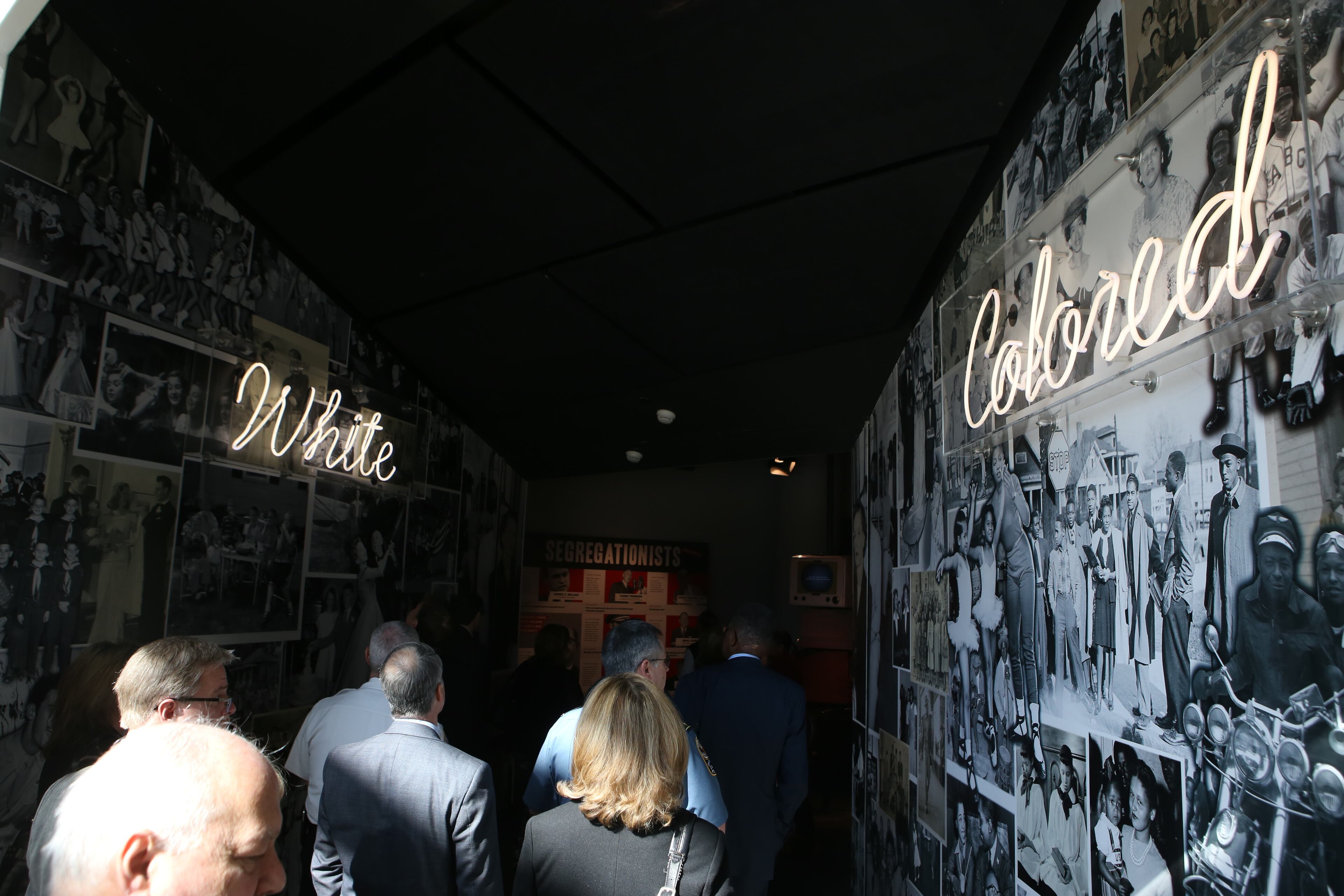 February 14, 2017, Atlanta, Georgia - The Gwinnett County Board of Commissioners walked through a display with a "White" wall and a "Colored" wall at the National Center for Civil and Human Rights in Atlanta, Georgia, on Tuesday, February 14, 2017. (HENRY TAYLOR / HENRY.TAYLOR@AJC.COM)