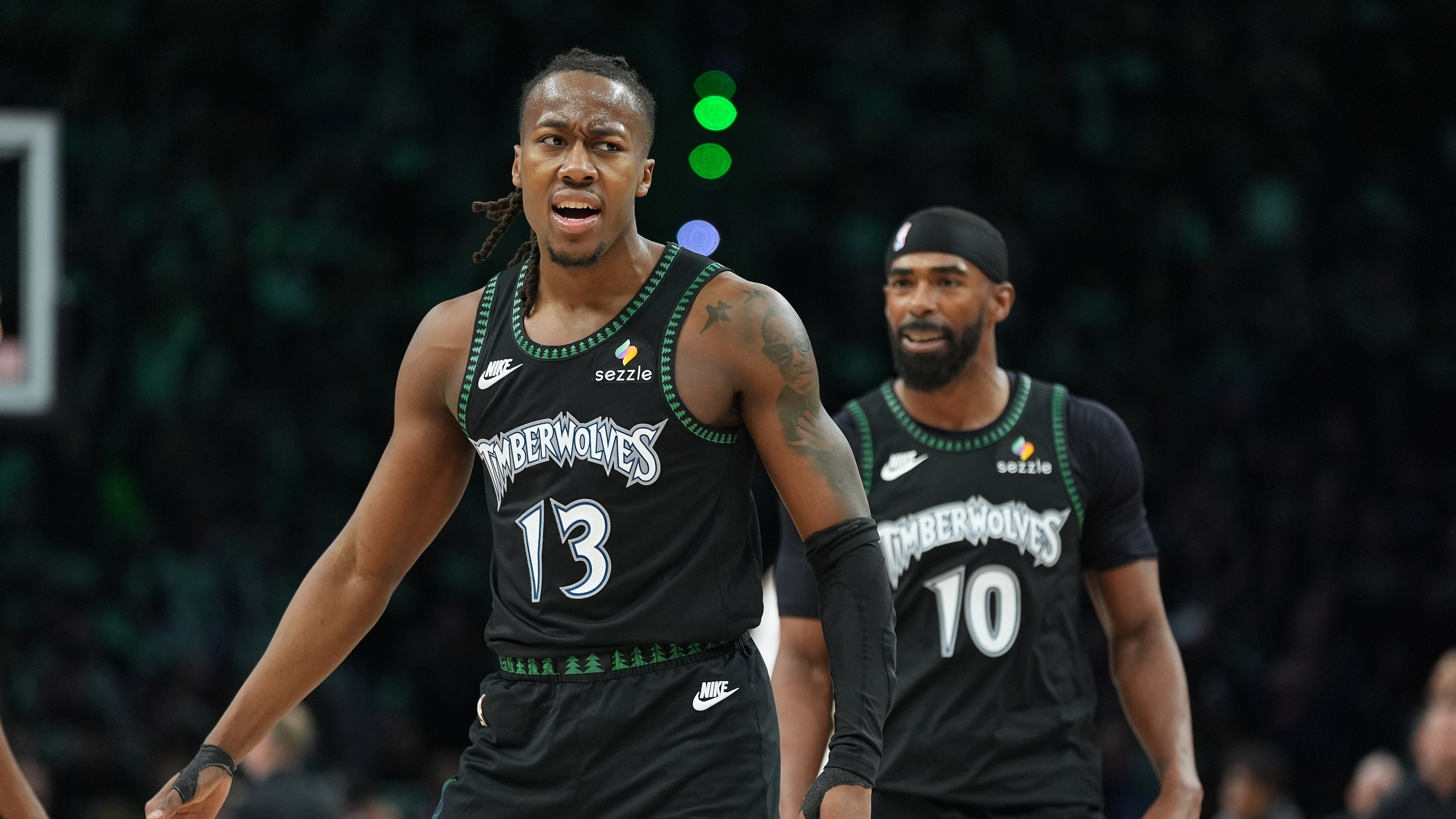 Minnesota Timberwolves guard Ayo Dosunmu (13) celebrates after making a 3-point basket during the second half of Game 4 of a first-round NBA basketball playoff series against the Denver Nuggets, Saturday, April 25, 2026, in Minneapolis. (AP Photo/Abbie Parr)