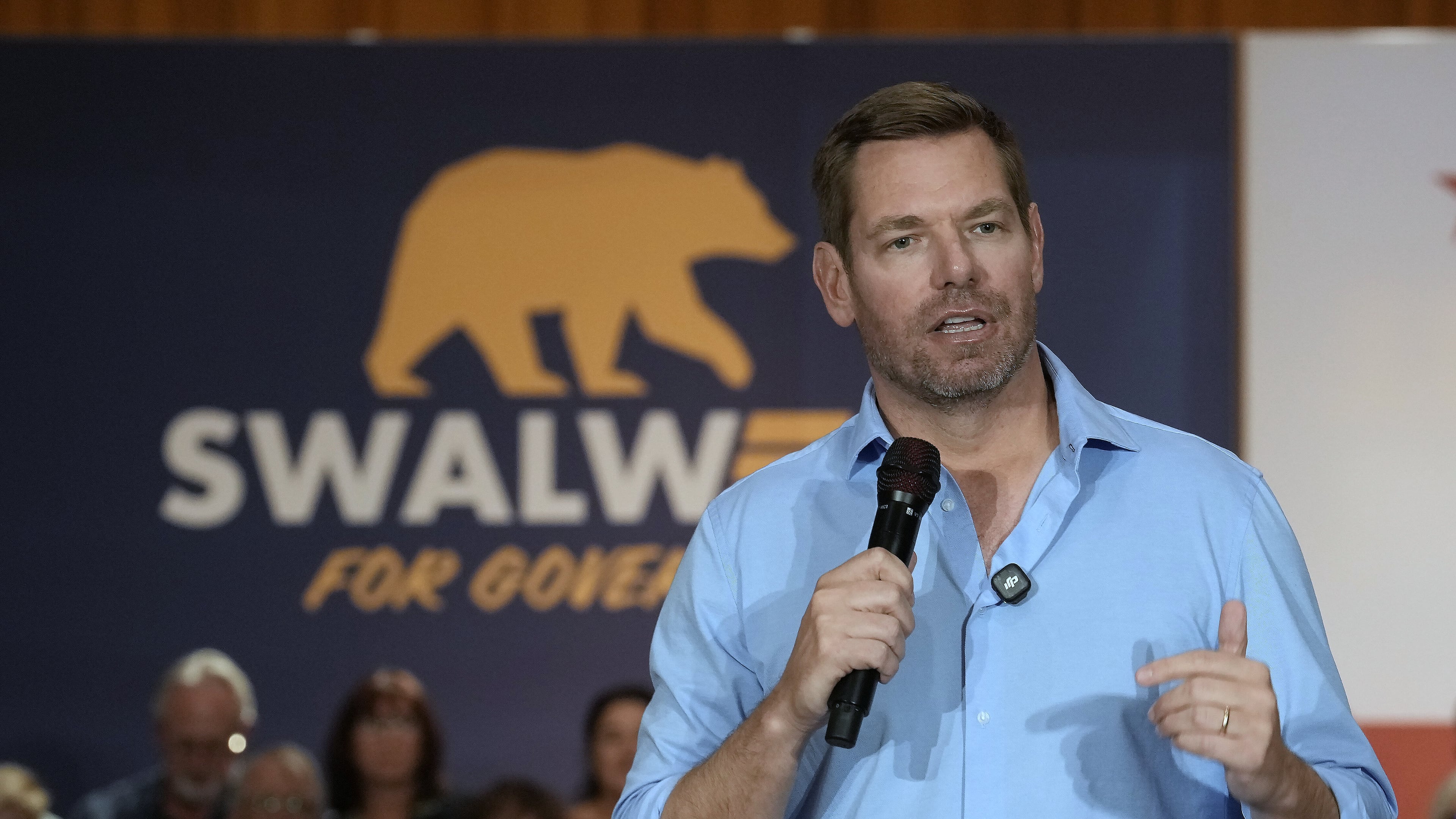 California gubernatorial candidate, Rep. Eric Swalwell, D-CA appears at a town hall meeting in Sacramento, Calif., Tuesday, April 7, 2026. (AP Photo/Rich Pedroncelli)
