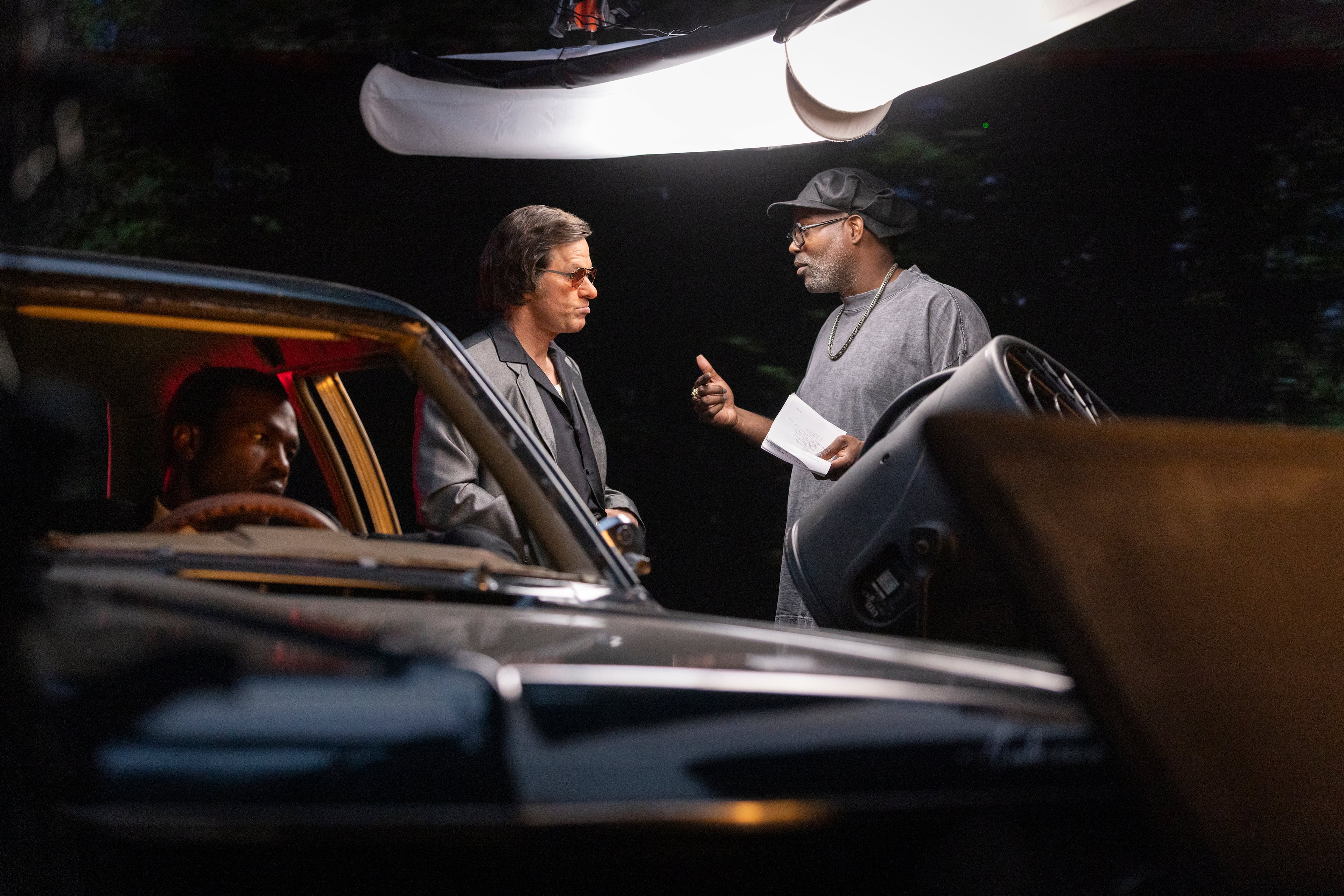 Mark Wahlberg, left, and director Elegance Bratton (right) on the set of Paramount Pictures' "By Any Means." (Courtesy of Paramount Pictures)