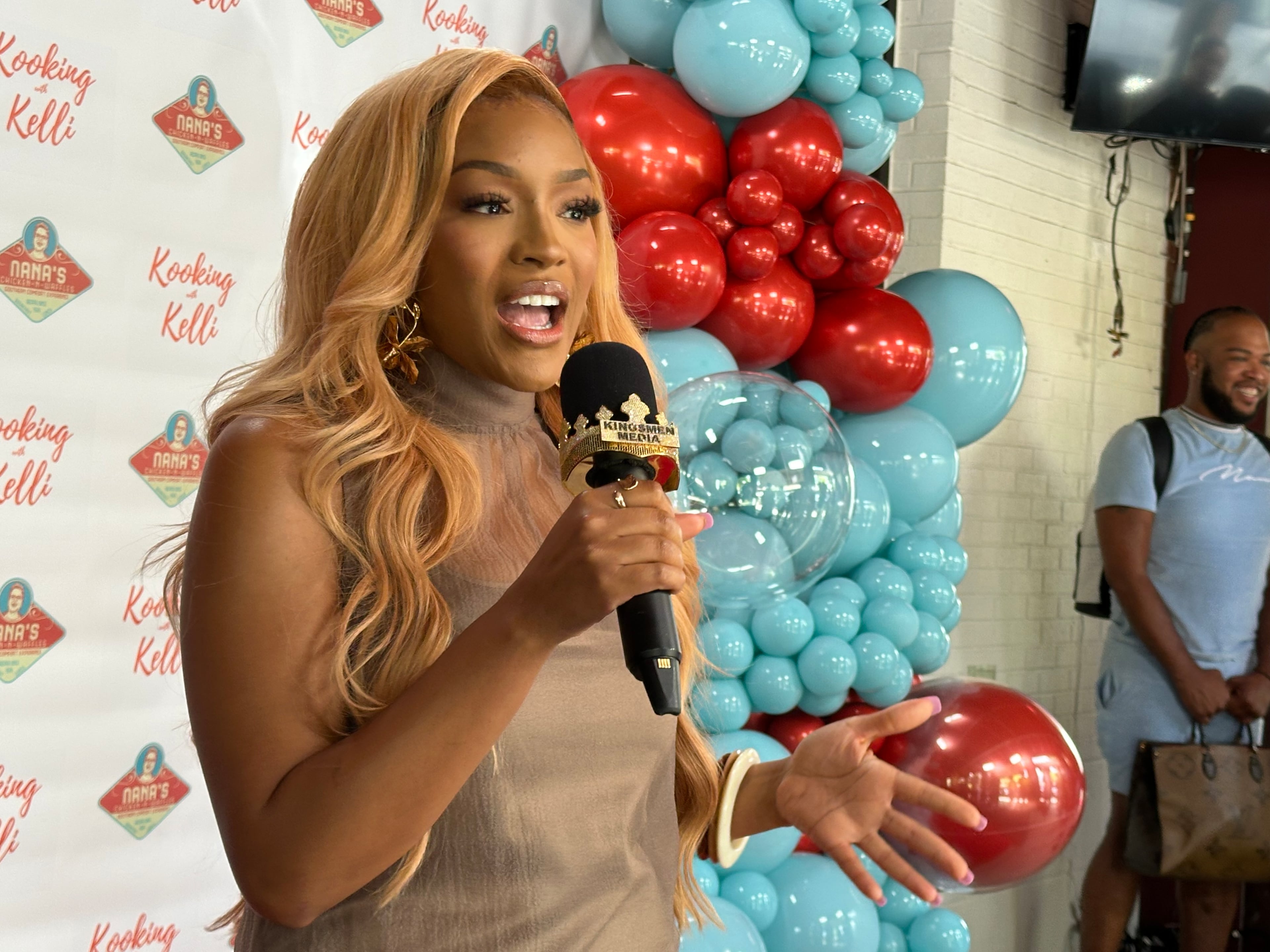 Drew Sidora at Kelli Ferrell's opening of her second Nana Chicken & Waffles in Sandy Springs Aug. 22, 2025. (Rodney Ho/AJC)