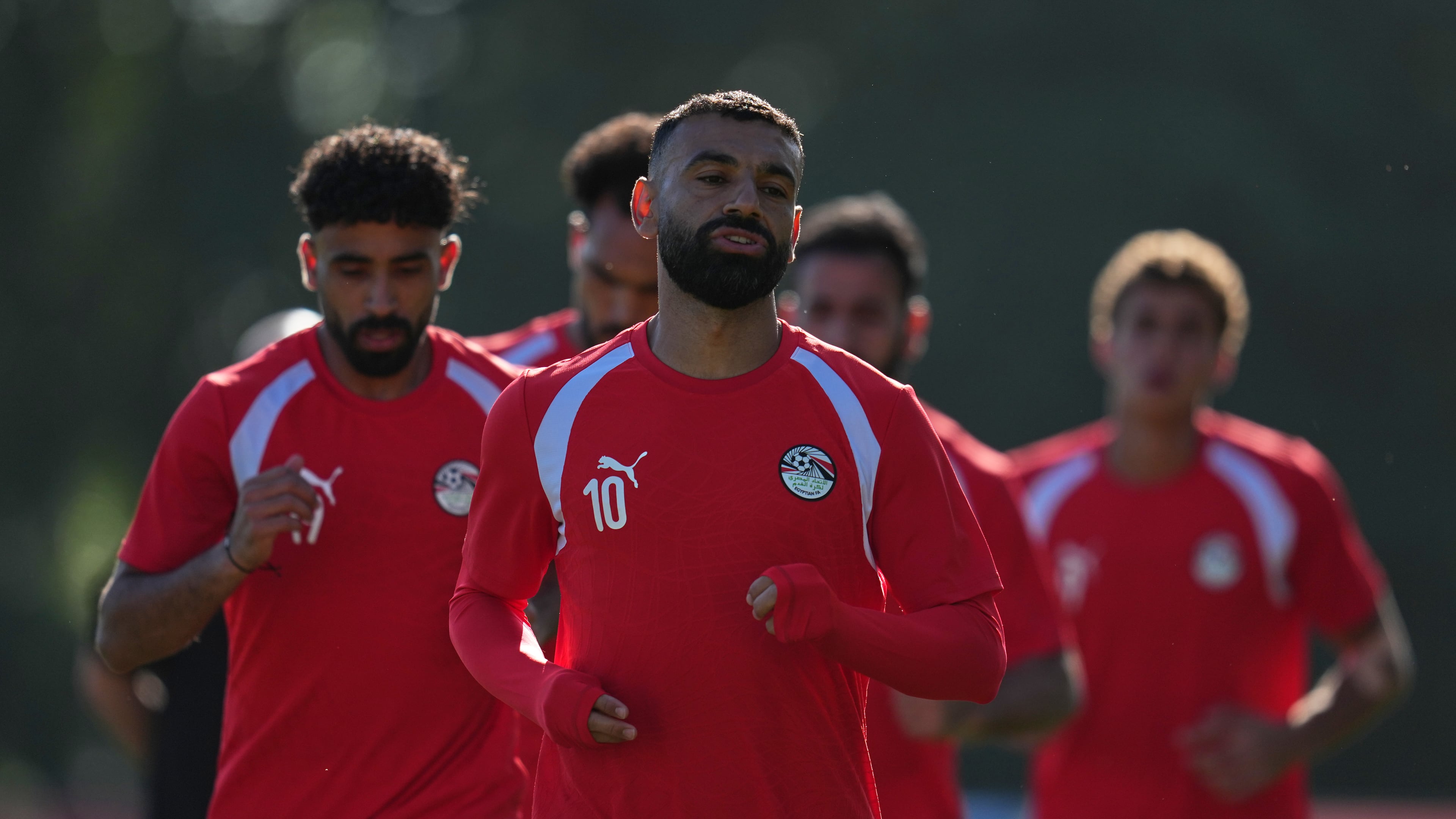 Egypt's Mohamed Salah, front, works out with teammates during a training session Saturday, June 20, 2026, on the eve of the team's World Cup Group G soccer match against New Zealand in Vancouver, British Columbia. (AP Photo/Abbie Parr)