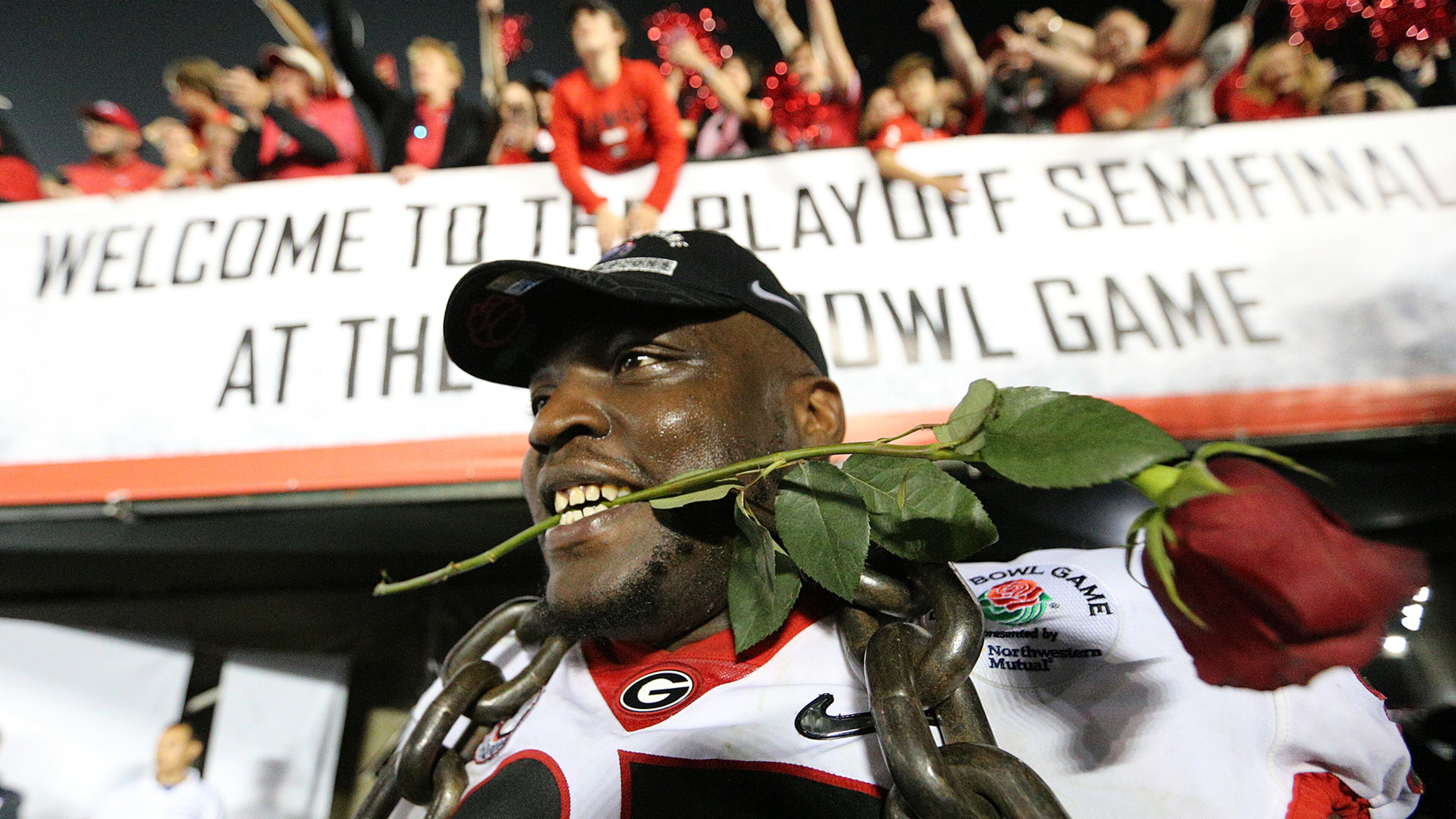 Georgia defender John Atkins celebrates beating Oklahoma 54-48 in the Rose Bowl. Curtis Compton/ccompton@ajc.com