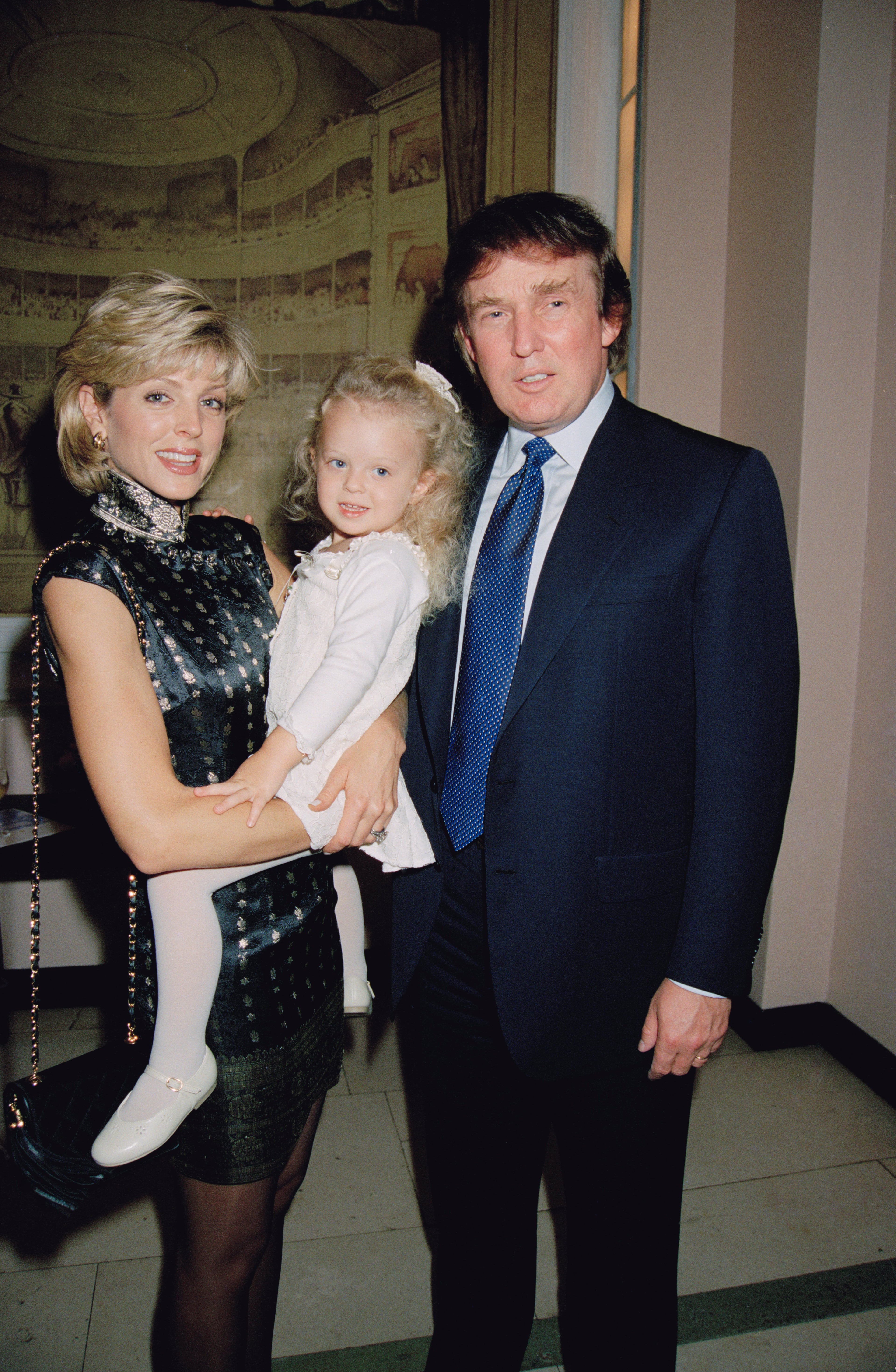 Businessman Donald Trump with his wife Marla Maples and their daughter Tiffany at the launch party for his latest New York hotel and tower, the Trump International Tower, at Claridges Hotel in London, 4th June 1996. (Photo by Dave Benett/Getty Images)