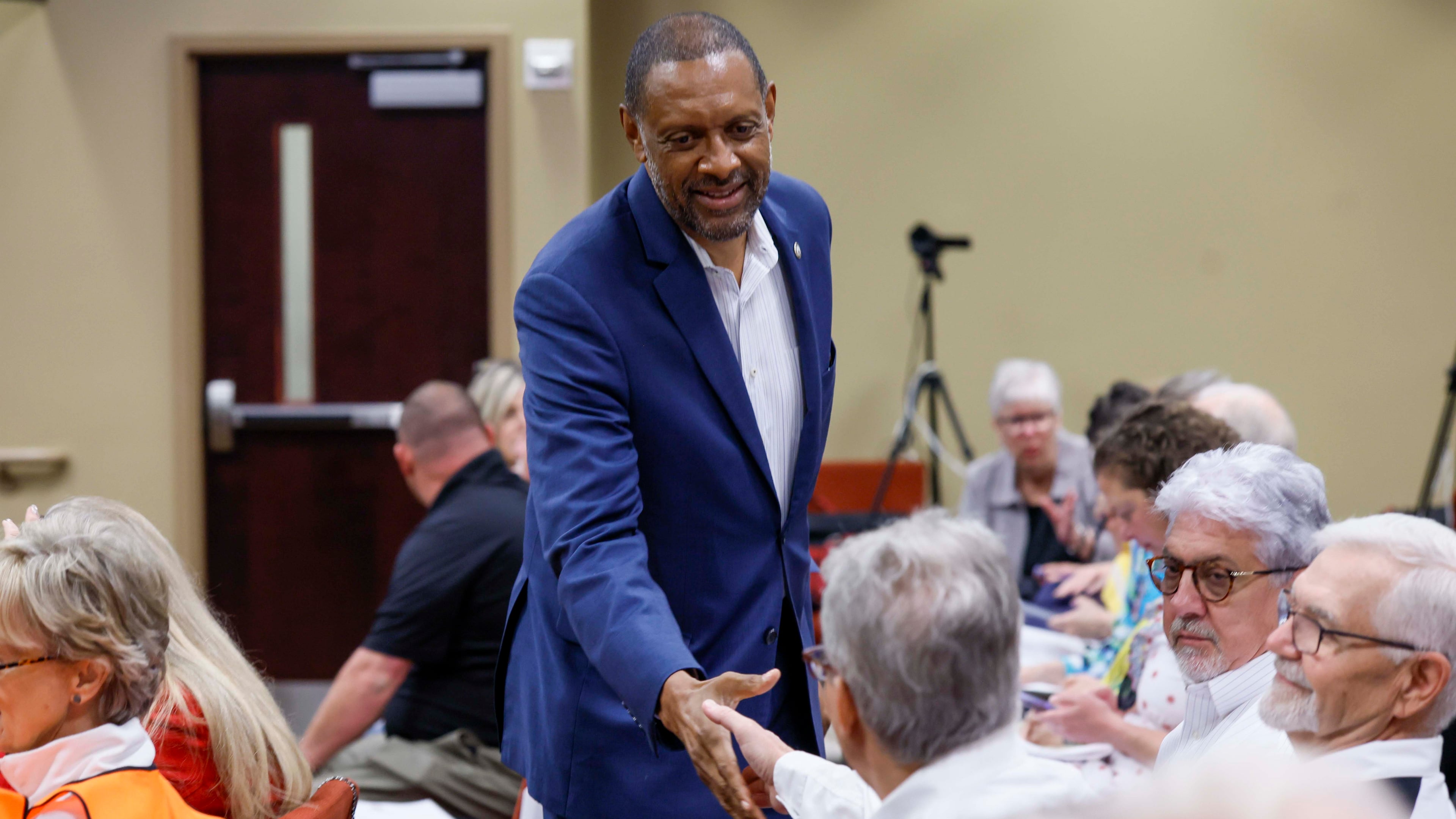 Secretary of state candidate Vernon Jones greets attendees at a State Election Board meeting held at the Dawson County Government Center on Wednesday, April 15, 2026. (Miguel Martinez/AJC)