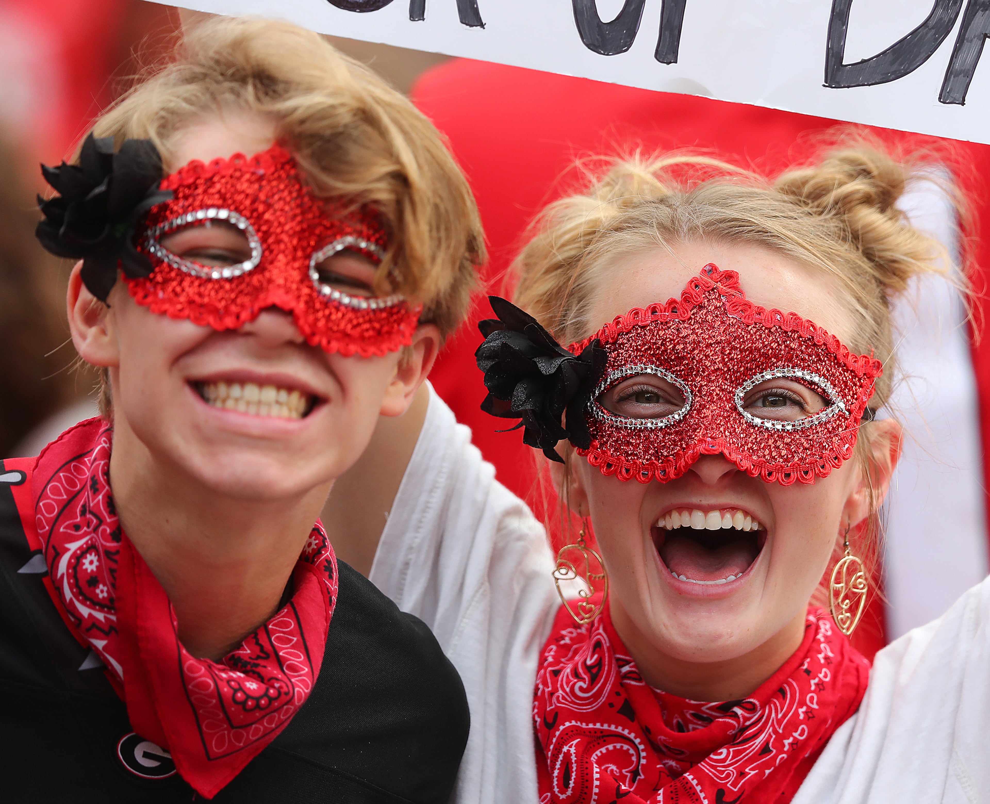 Masked up Georgia fans cheer their team against Arkansas in a top-10 showdown in a NCAA college football game on Saturday, Oct. 2, 2021, in Athens. “Curtis Compton / Curtis.Compton@ajc.com”