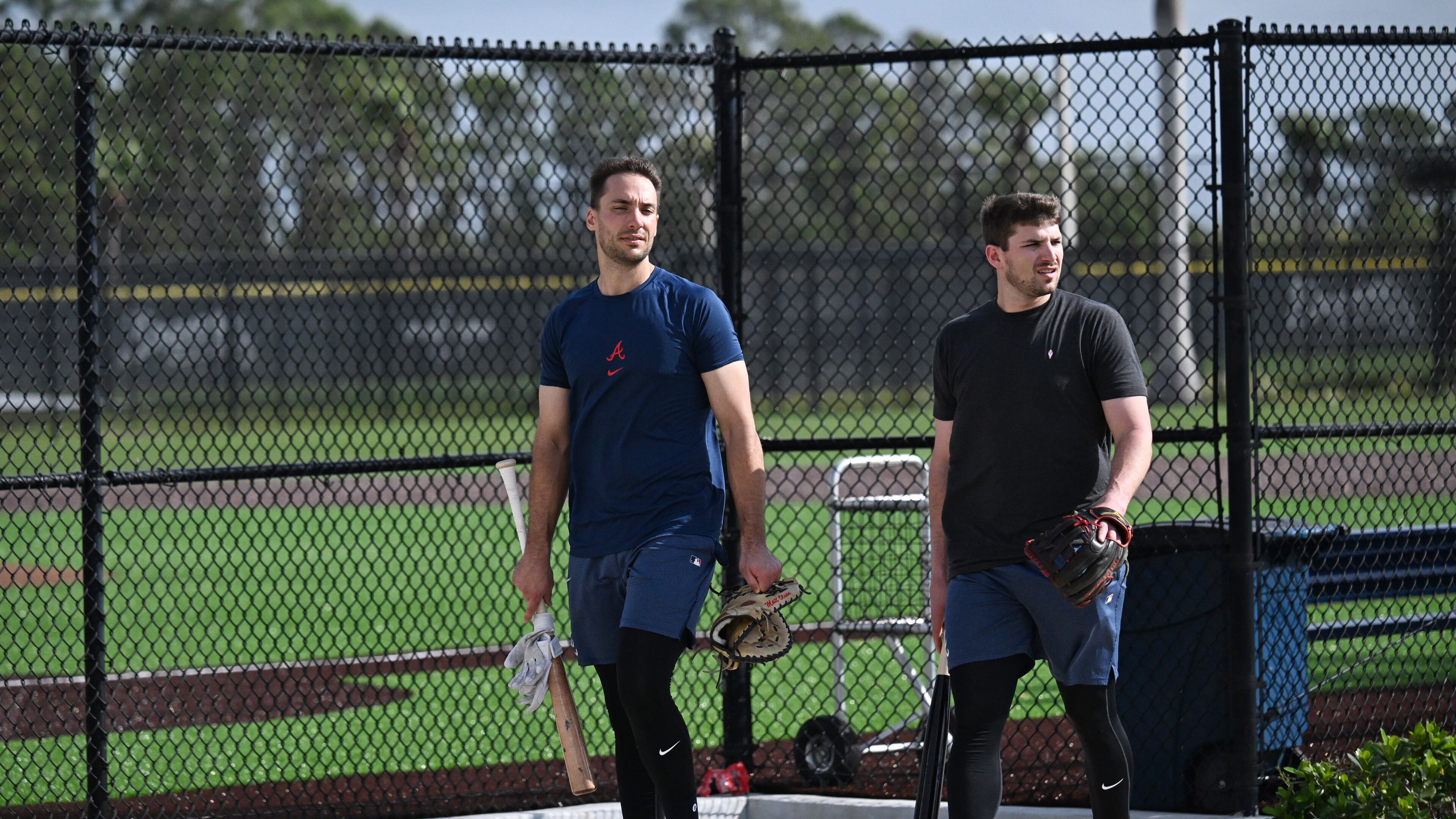 Atlanta Braves first base Matt Olson (left) and third base Austin Riley walk back to the clubhouse during spring training workouts at CoolToday Park, Thursday, February 13, 2025, North Port, Florida. (Hyosub Shin / AJC)