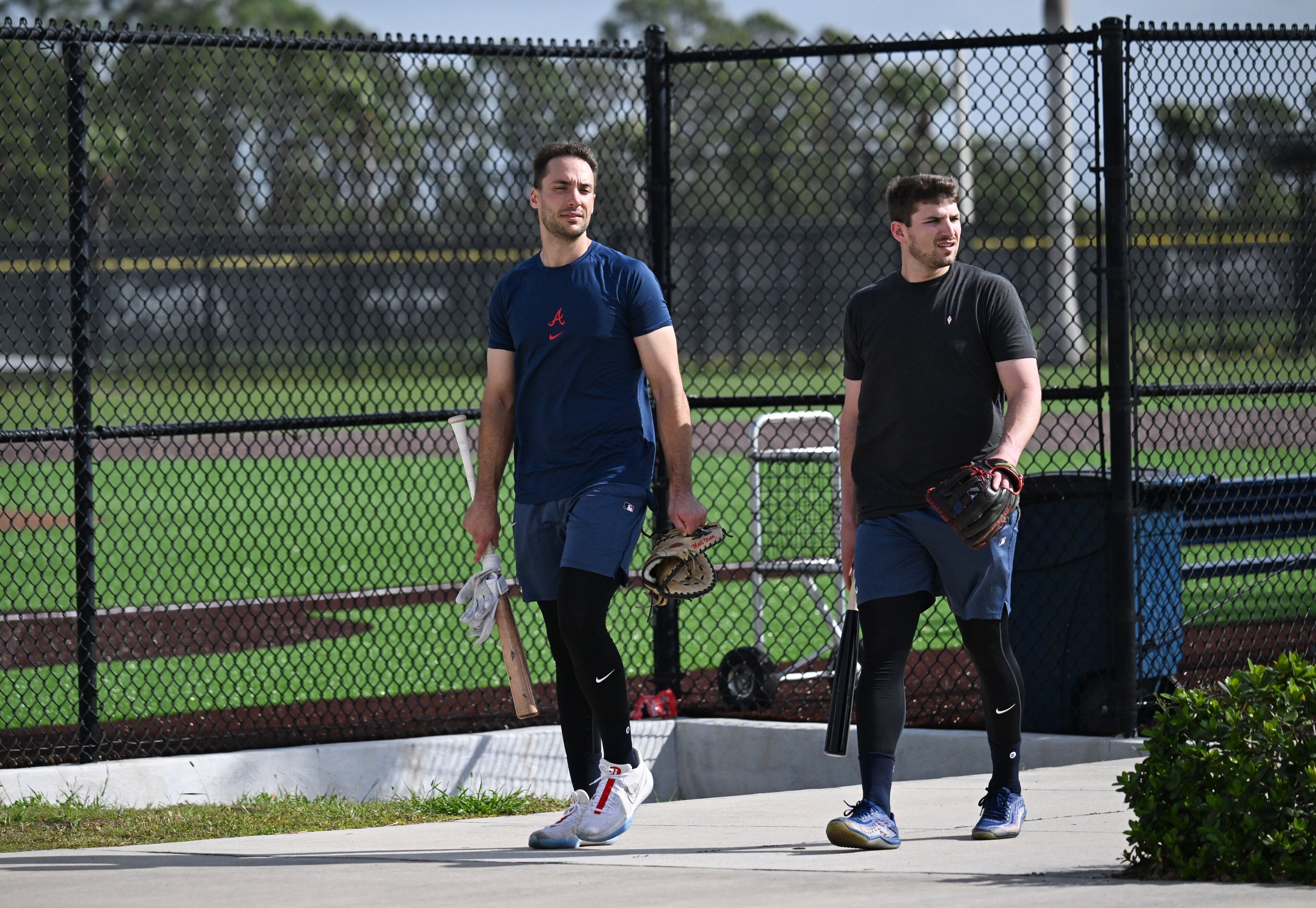 Atlanta Braves first base Matt Olson (left) and third base Austin Riley walk back to the clubhouse during spring training workouts at CoolToday Park, Thursday, February 13, 2025, North Port, Florida. (Hyosub Shin / AJC)