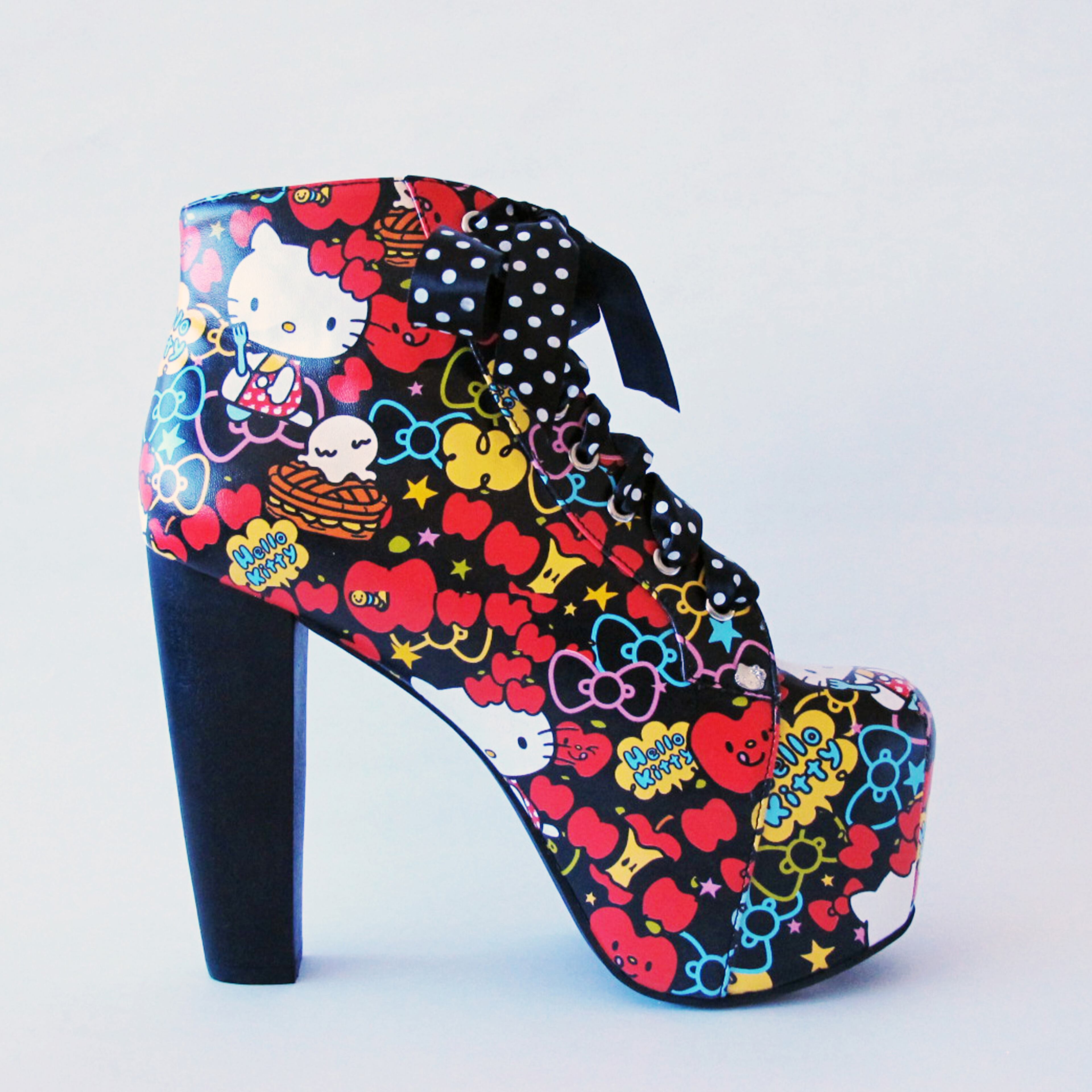 This photo provided by Sanrio shows the hello Kitty "Lita" high-heel shoe that is included in the Hello Kitty new limited edition products for the Hello Kitty 40th anniversary. The first Hello Kitty Con, a four-day festival of all things Kitty held in honor of the character's 40th birthday, opens Oct. 30, 2014, in Los Angeles. (AP Photo/Sanrio)