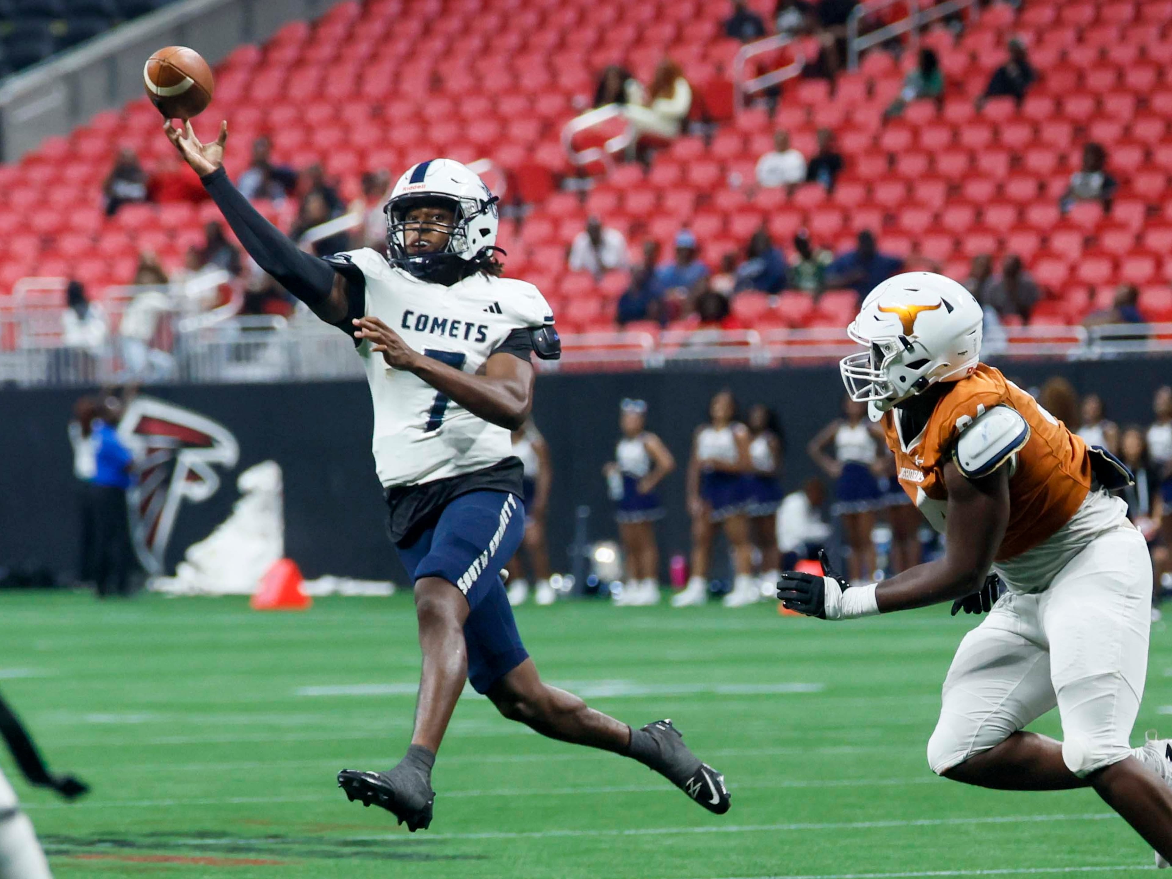 South Gwinnett quarterback CJ Peoples (7) attempts a pass in the first half against Lanier at the Corky Kell + Dave Hunter Classic on Wednesday, Aug. 12, 2026, at Mercedes-Benz Stadium in Atlanta. (Miguel Martinez/AJC)