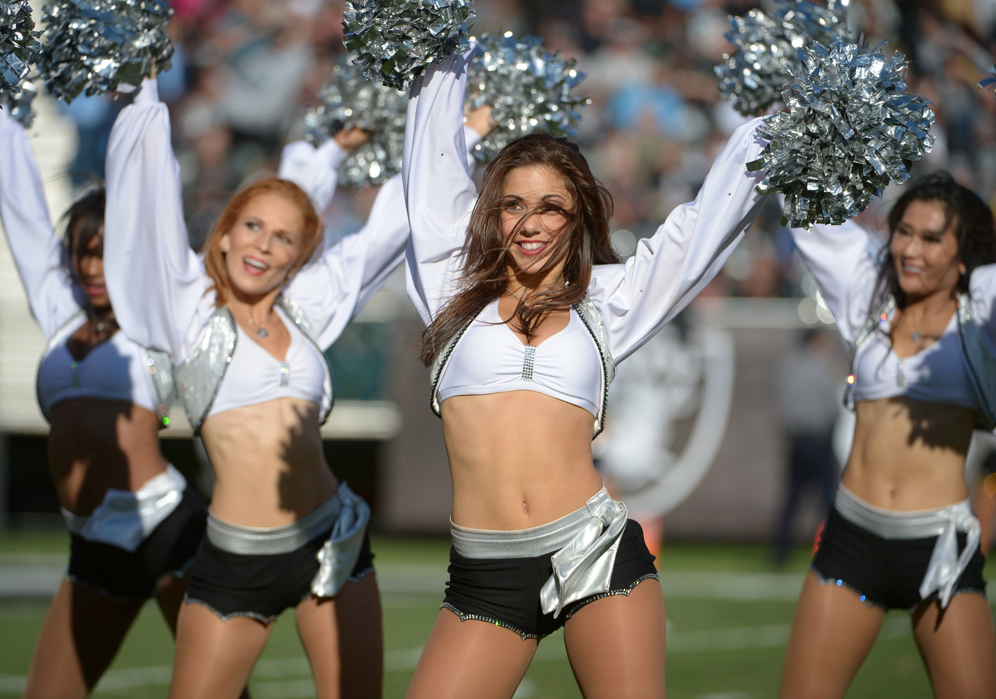 Oakland Raiders cheerleaders perform during the game against the Tennessee Titans at O.co Coliseum. Mandatory Credit: Kirby Lee-USA TODAY Sports