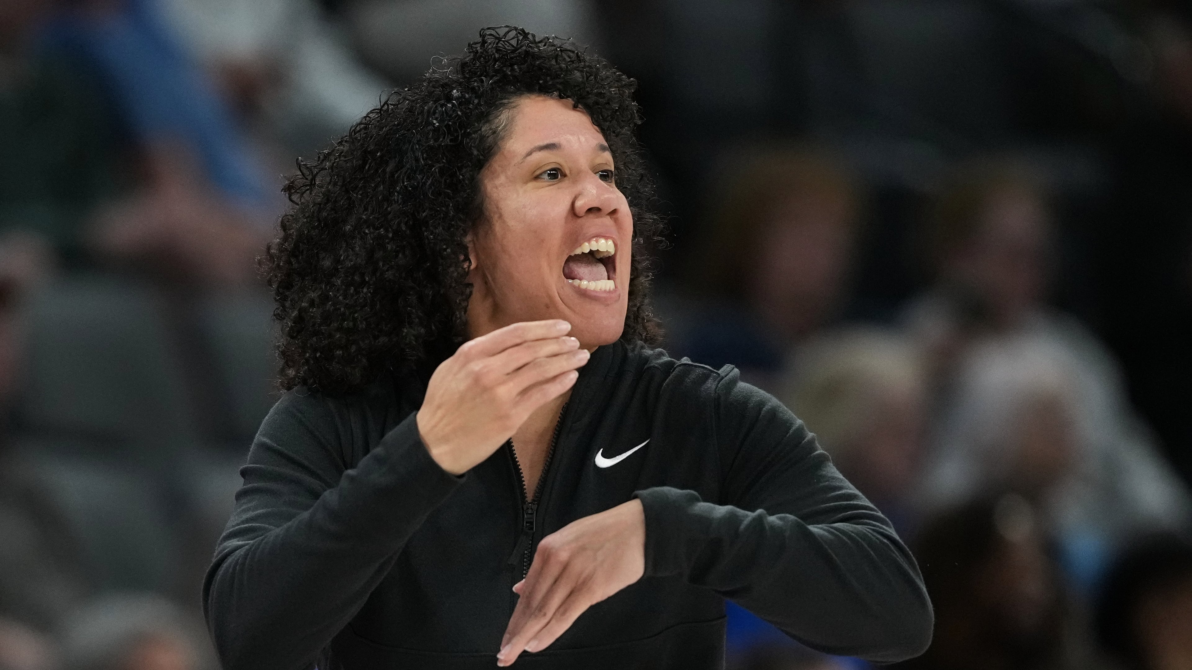 FILE - Duke head coach Kara Lawson reacts to a play during the first half of an NCAA college basketball game against UCLA in the Players Era tournament in Las Vegas, Nov. 27, 2025. (AP Photo/Eric Gay, File)