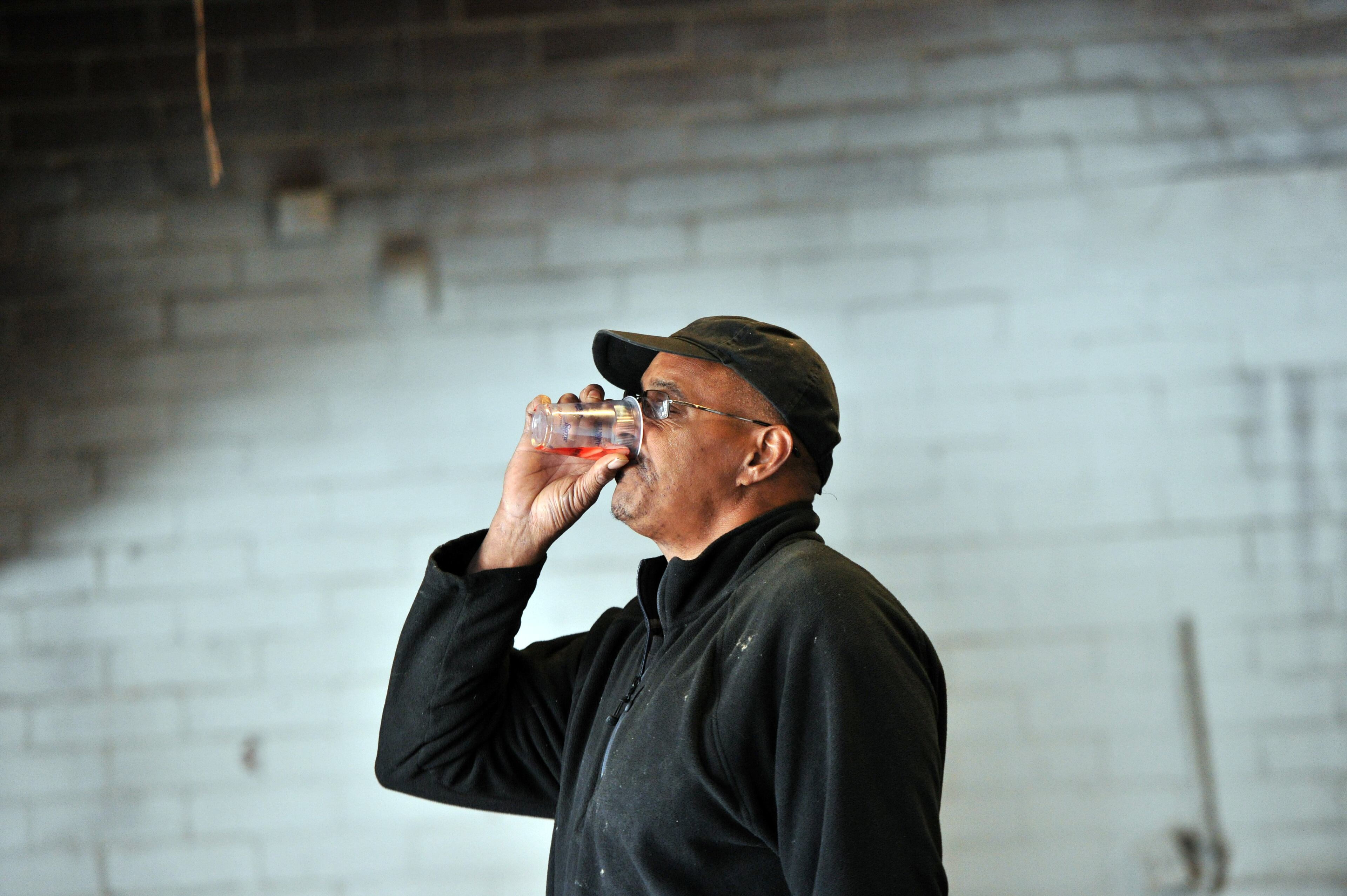 Jeffery Stephens takes a water break as he unloads donations for the Furniture Bank of Metro Atlanta. Stephens is an Army veteran, who isn’t homeless, entered the internship after contracting work dried up. The Furniture Bank works with the United Way where they employ veterans, many of them homeless, to help them get experience in their warehouse. HYOSUB SHIN / HSHIN@AJC.COM