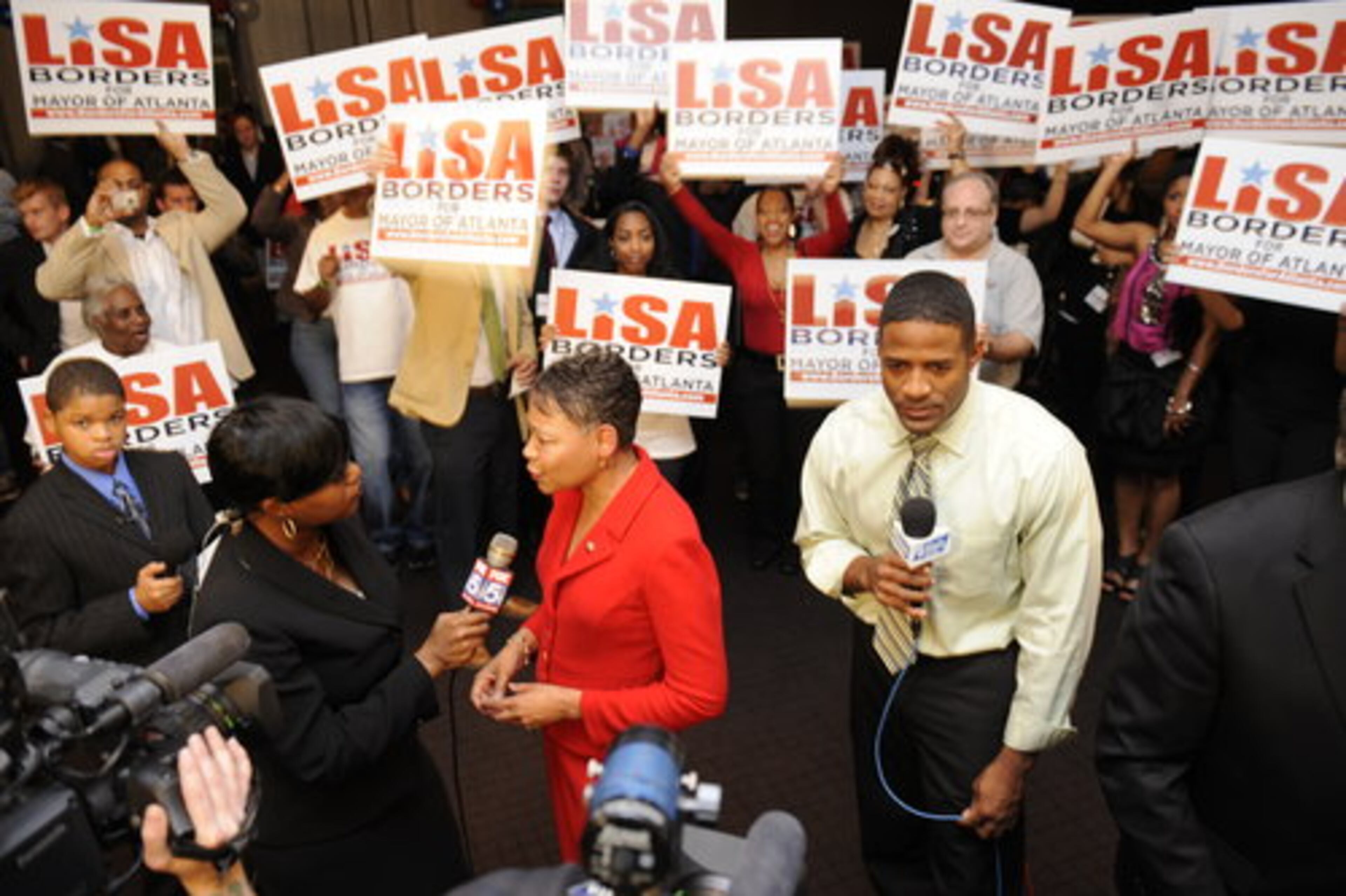 Lisa Borders talks with the media.