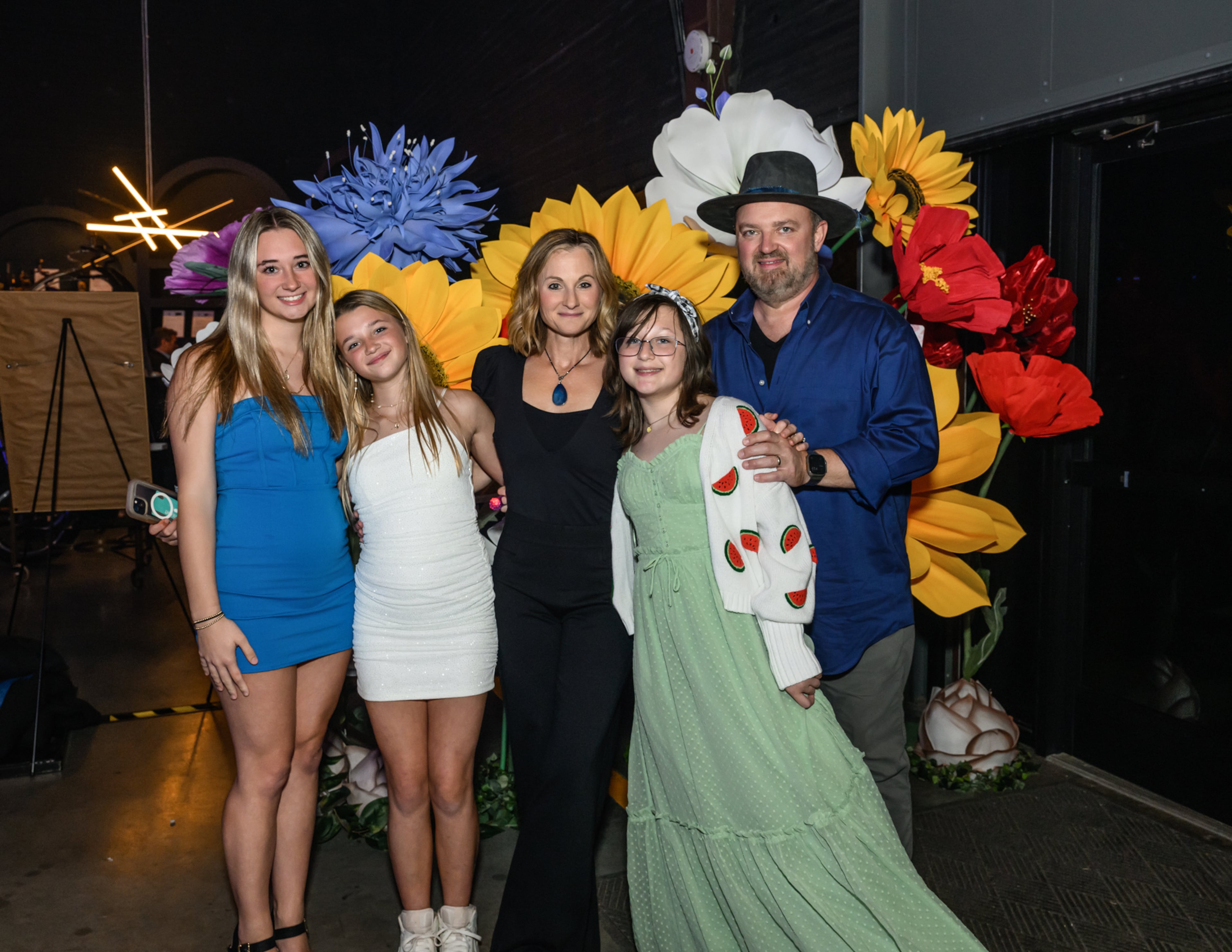 Pictured (L-R): Grace, Hope, Jennifer, Faith and John Driskell Hopkins at the first Harmony for Hope gala to raise money for the Hop on a Cure Foundation seeking a cure for ALS. (Courtesy of Jolie Loren Rizzi)