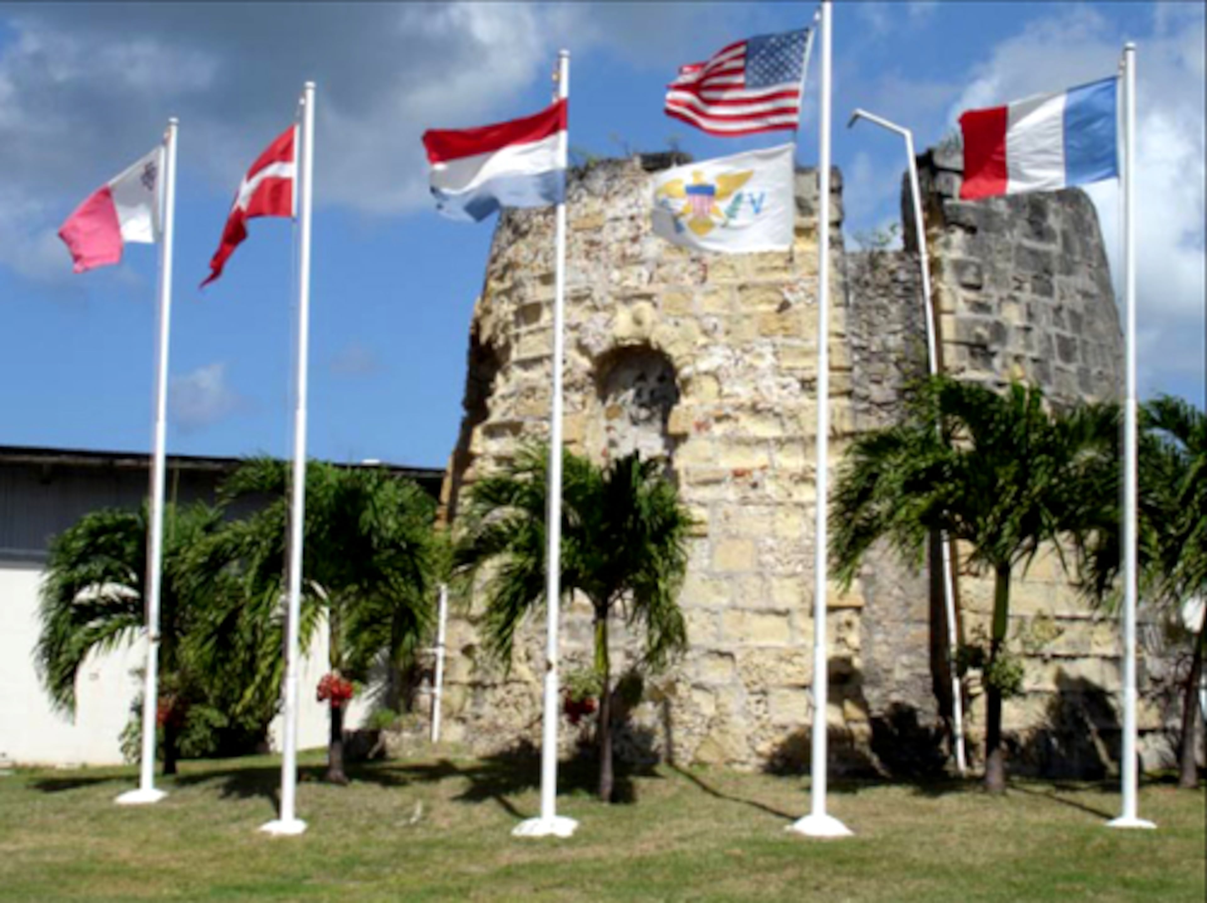 Six flags fly at the historic Cruzan Rum Distillery in St. Croix.