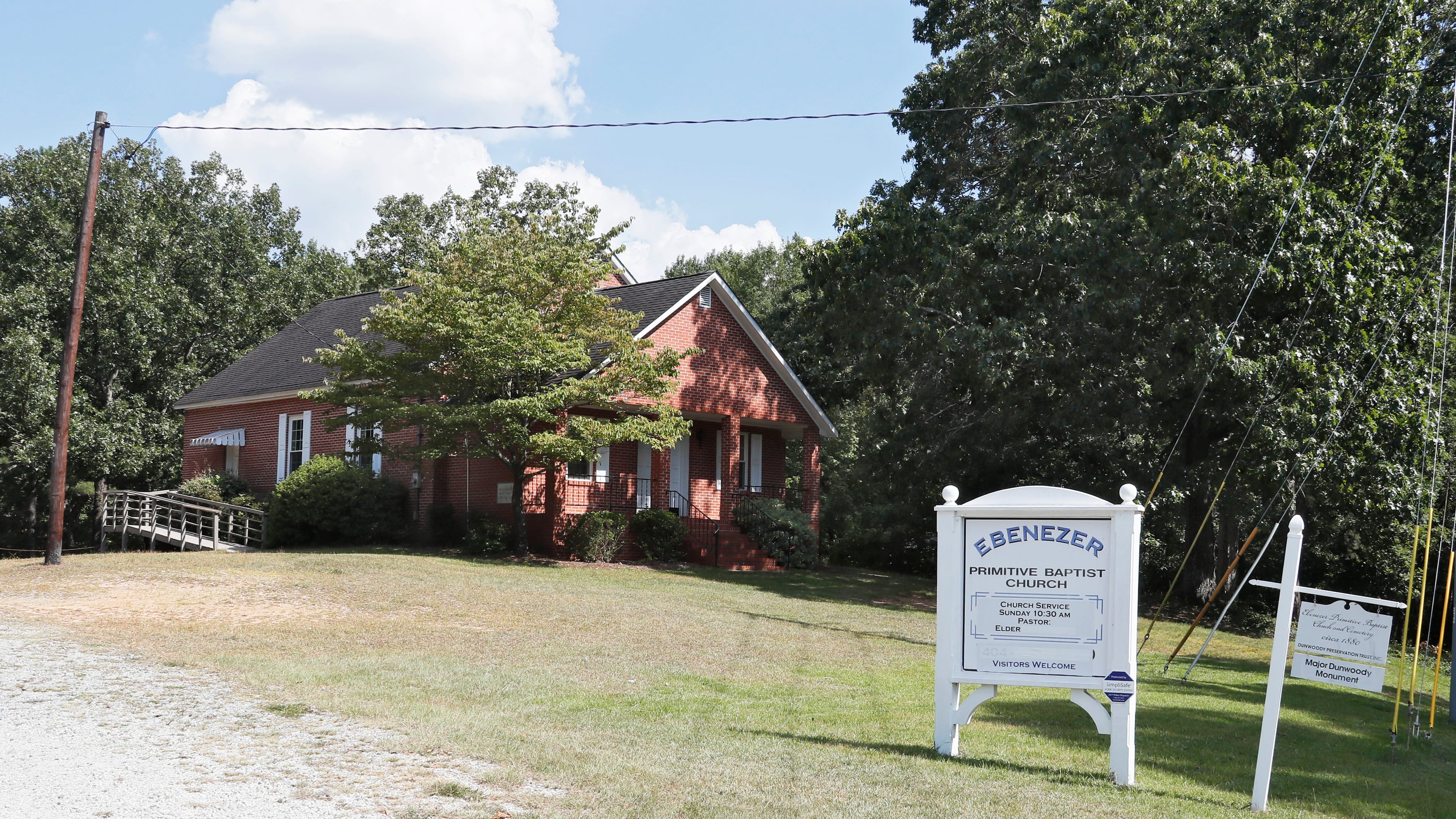 September 3, 2019, 2019 - Atlanta - The pastor of a small Sandy Springs church has been arrested and charged with child molestation. Gus Harter is the pastor for Ebenezer Primitive Baptist Church on Roberts Drive. As of this afternoon, his name was taped over on the sign. Bob Andres / robert.andres@ajc.com