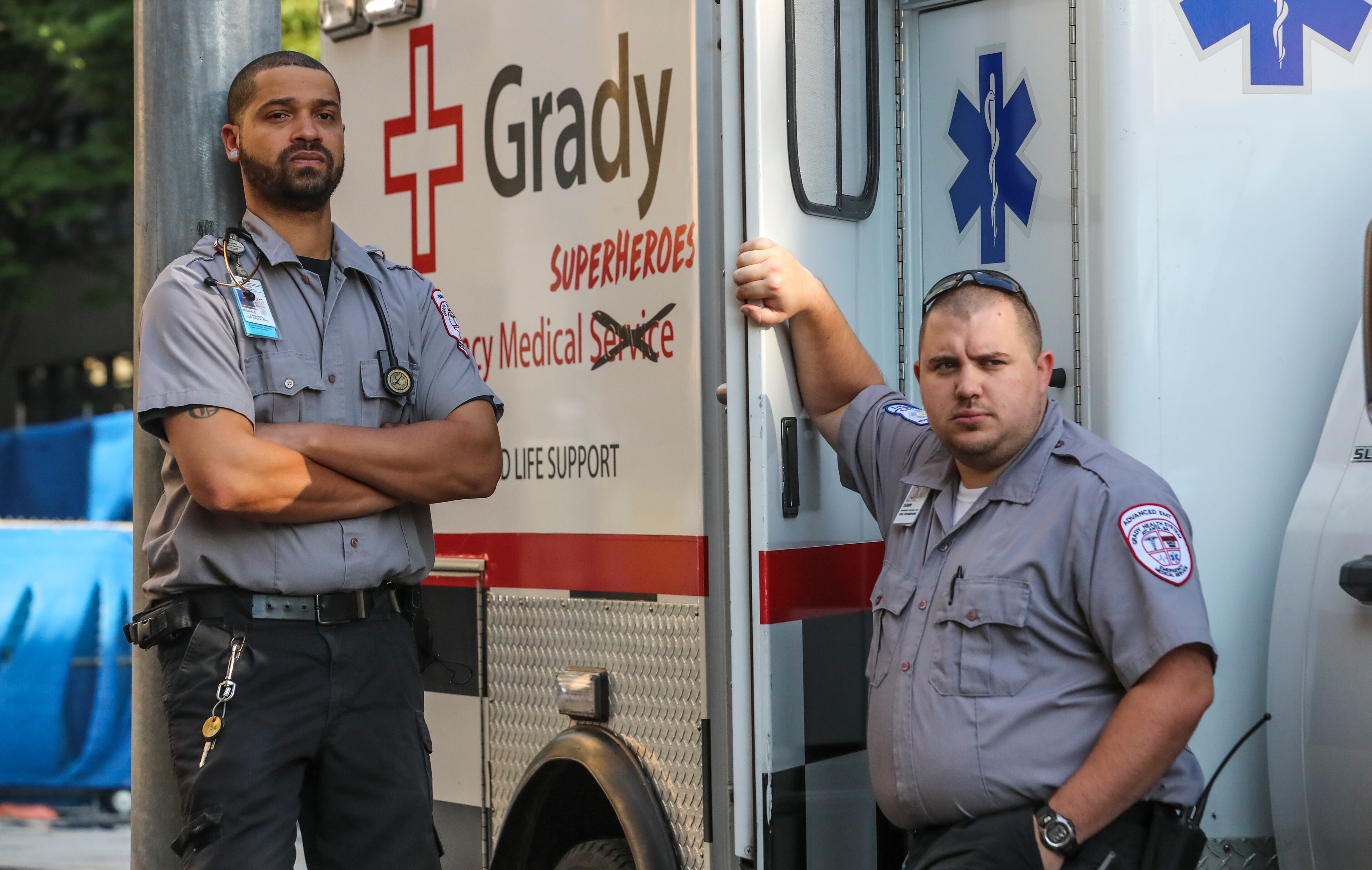 May 19, 2020 Atlanta: Grady EMS paramedic, Reginald McDaniel (left) and advanced EMT, Jerry Payne (right). Commenting on the pandemic, Paramedic, Reginald McDaniel said, "I can't wait until it's over. It's sad to see the people who don't believe that this is going on.The people who are out here doing stuff, street racing and, I don't know, parties. I can't expect people to stay in the house 24-7. I mean, human contact is very important but, I figure people should be smart about what they're doing." Advanced EMT Jerry Payne said his service during the pandemic has meant, "Be there for each other, help each other out." JOHN SPINK/JSPINK@AJC.COM