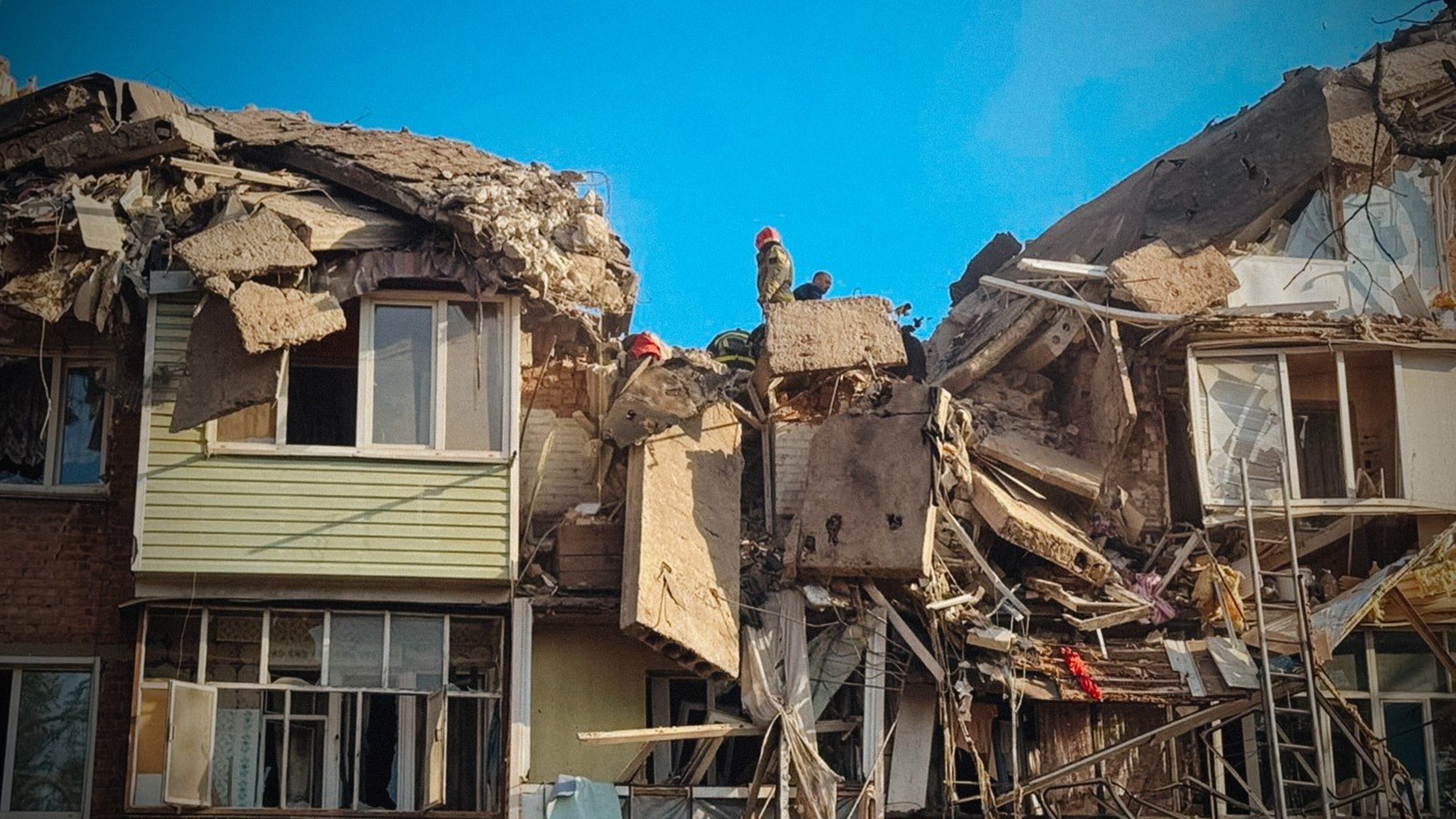 In this photo provided by the Ukrainian Emergency Service, rescuers work on the scene of a building destroyed following recent Russian attacks in Pryluky, Chernihiv region, Ukraine, Wednesday, Oct. 7, 2026. (Ukrainian Emergency Service via AP )