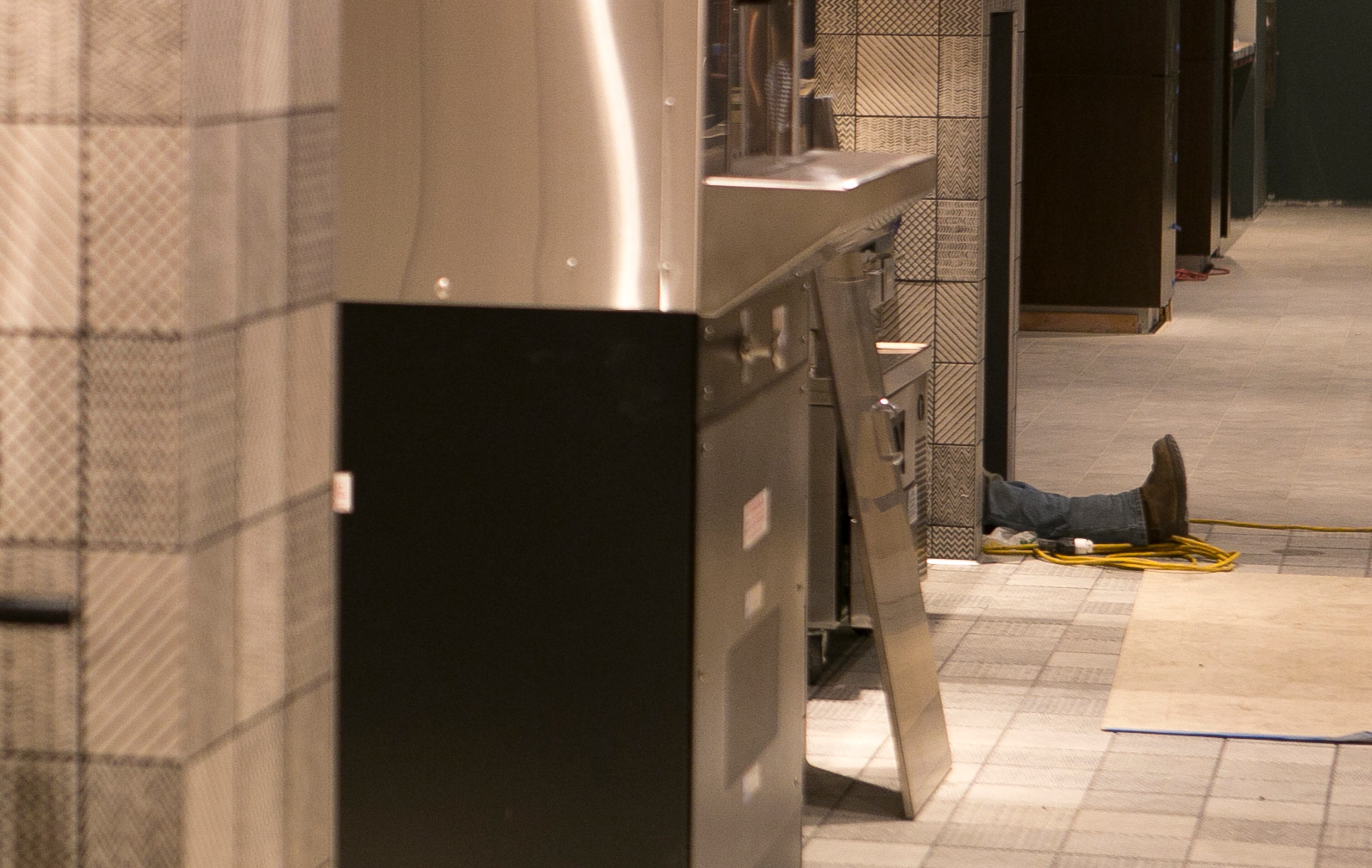 A construction worker takes a break by the Chefs Club area during a guided media tour through the in-progress renovations at the State Farm Arena in Atlanta, Ga., on Thurs., Sept. 20, 2018. The renovations, which total $192.5 million, are on track to be completed by the arena's scheduled open house on October 20. The current rate of progress is about $1 million of work per day, according to Brett Stefansson, Atlanta Hawks executive vice president and general manager of State Farm Arena. (CASEY SYKES, CASEYLANESYKES@GMAIL.COM)