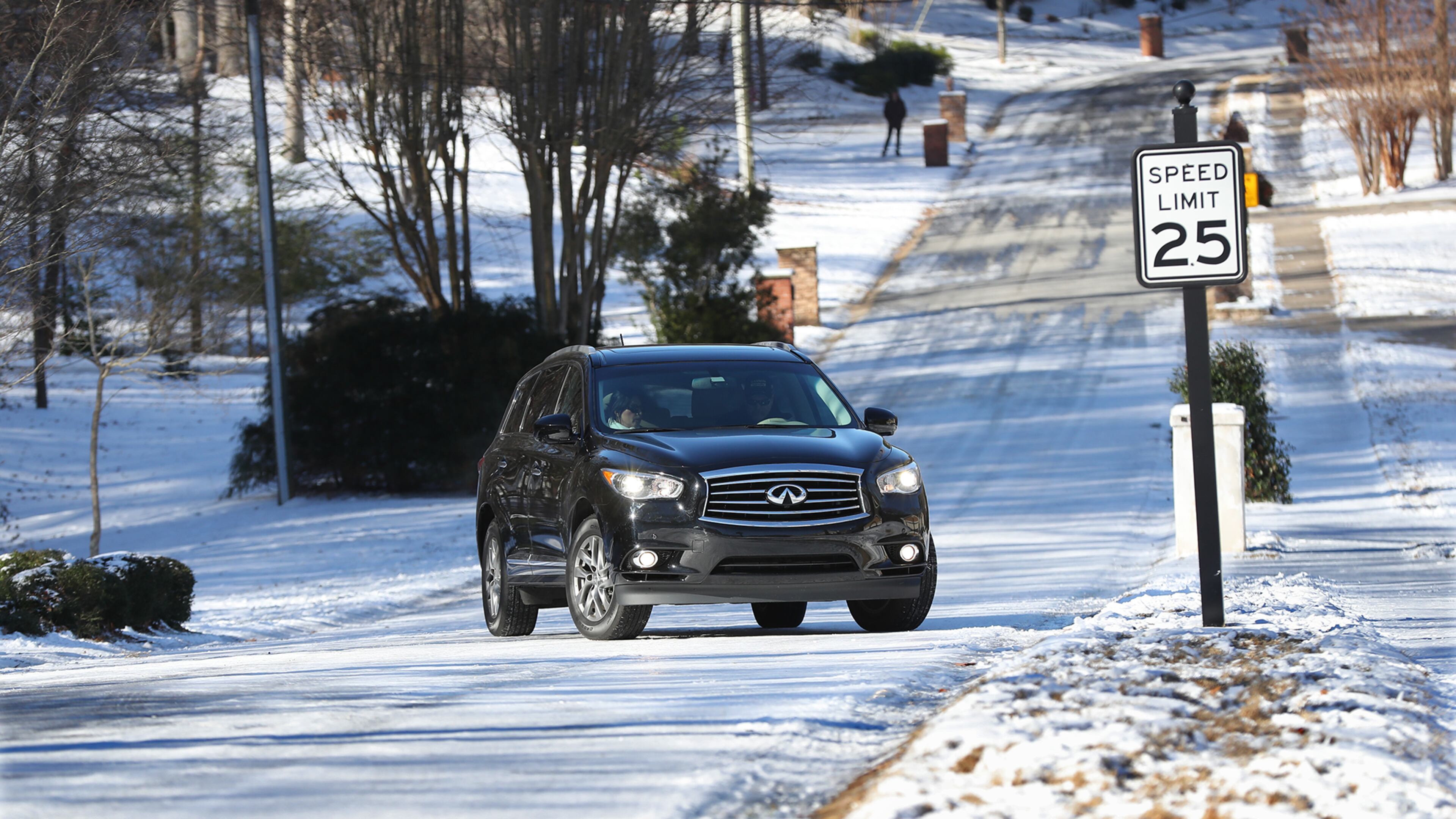 January 8, 2017, Canton: A motorist slips back down Pine Terrace Road unable to make it up the ice covered road in Cherokee Falls Estates at the Lake on Sunday, Jan. 8, 2017, in Canton. Secondary roads are still a safety concern for motorists. Curtis Compton/ccompton@ajc.com